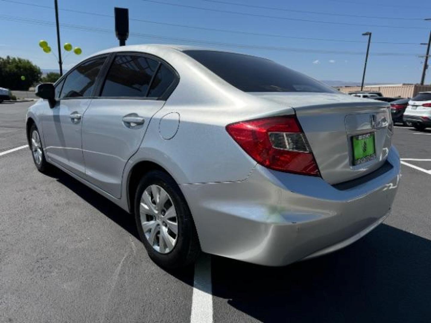 2012 Alabaster Silver Metallic /Gray Cloth Interior Honda Civic LX Sedan 5-Speed AT (2HGFB2F52CH) with an 1.8L L4 SOHC 16V engine, 5-Speed Automatic transmission, located at 1865 East Red Hills Pkwy, St. George, 84770, (435) 628-0023, 37.120850, -113.543640 - Photo#4