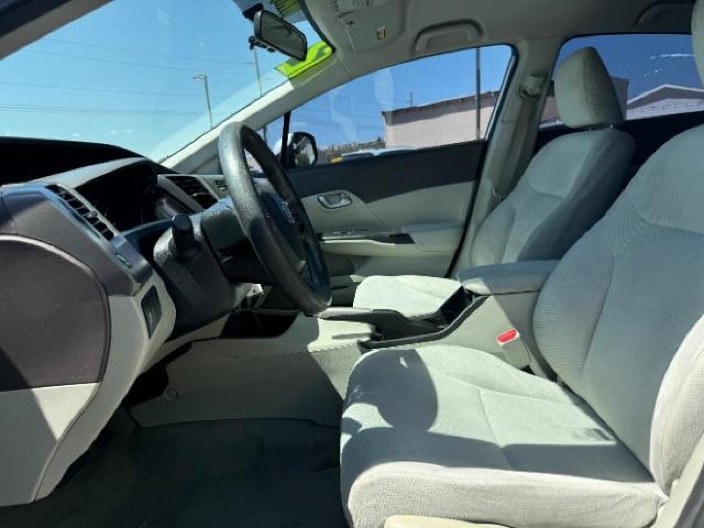 2012 Alabaster Silver Metallic /Gray Cloth Interior Honda Civic LX Sedan 5-Speed AT (2HGFB2F52CH) with an 1.8L L4 SOHC 16V engine, 5-Speed Automatic transmission, located at 1865 East Red Hills Pkwy, St. George, 84770, (435) 628-0023, 37.120850, -113.543640 - We specialize in helping ALL people get the best financing available. No matter your credit score, good, bad or none we can get you an amazing rate. Had a bankruptcy, divorce, or repossessions? We give you the green light to get your credit back on the road. Low down and affordable payments that fit - Photo#13