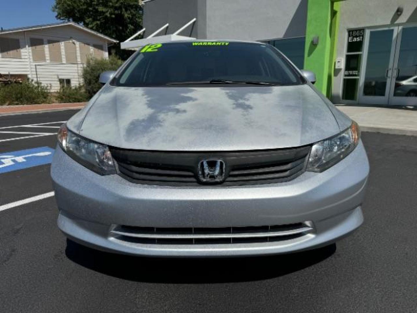 2012 Alabaster Silver Metallic /Gray Cloth Interior Honda Civic LX Sedan 5-Speed AT (2HGFB2F52CH) with an 1.8L L4 SOHC 16V engine, 5-Speed Automatic transmission, located at 1865 East Red Hills Pkwy, St. George, 84770, (435) 628-0023, 37.120850, -113.543640 - We specialize in helping ALL people get the best financing available. No matter your credit score, good, bad or none we can get you an amazing rate. Had a bankruptcy, divorce, or repossessions? We give you the green light to get your credit back on the road. Low down and affordable payments that fit - Photo#1