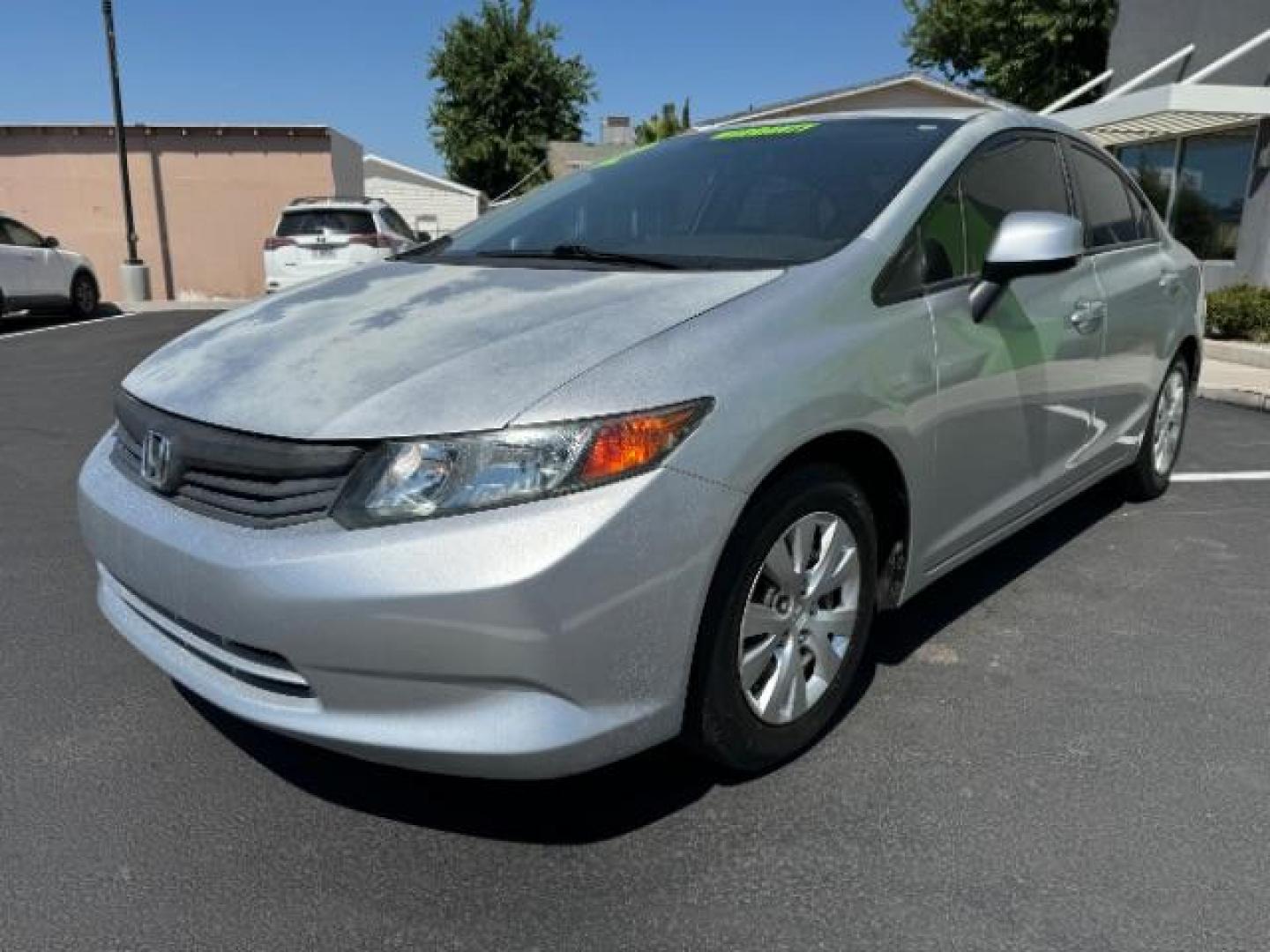 2012 Alabaster Silver Metallic /Gray Cloth Interior Honda Civic LX Sedan 5-Speed AT (2HGFB2F52CH) with an 1.8L L4 SOHC 16V engine, 5-Speed Automatic transmission, located at 1865 East Red Hills Pkwy, St. George, 84770, (435) 628-0023, 37.120850, -113.543640 - We specialize in helping ALL people get the best financing available. No matter your credit score, good, bad or none we can get you an amazing rate. Had a bankruptcy, divorce, or repossessions? We give you the green light to get your credit back on the road. Low down and affordable payments that fit - Photo#2