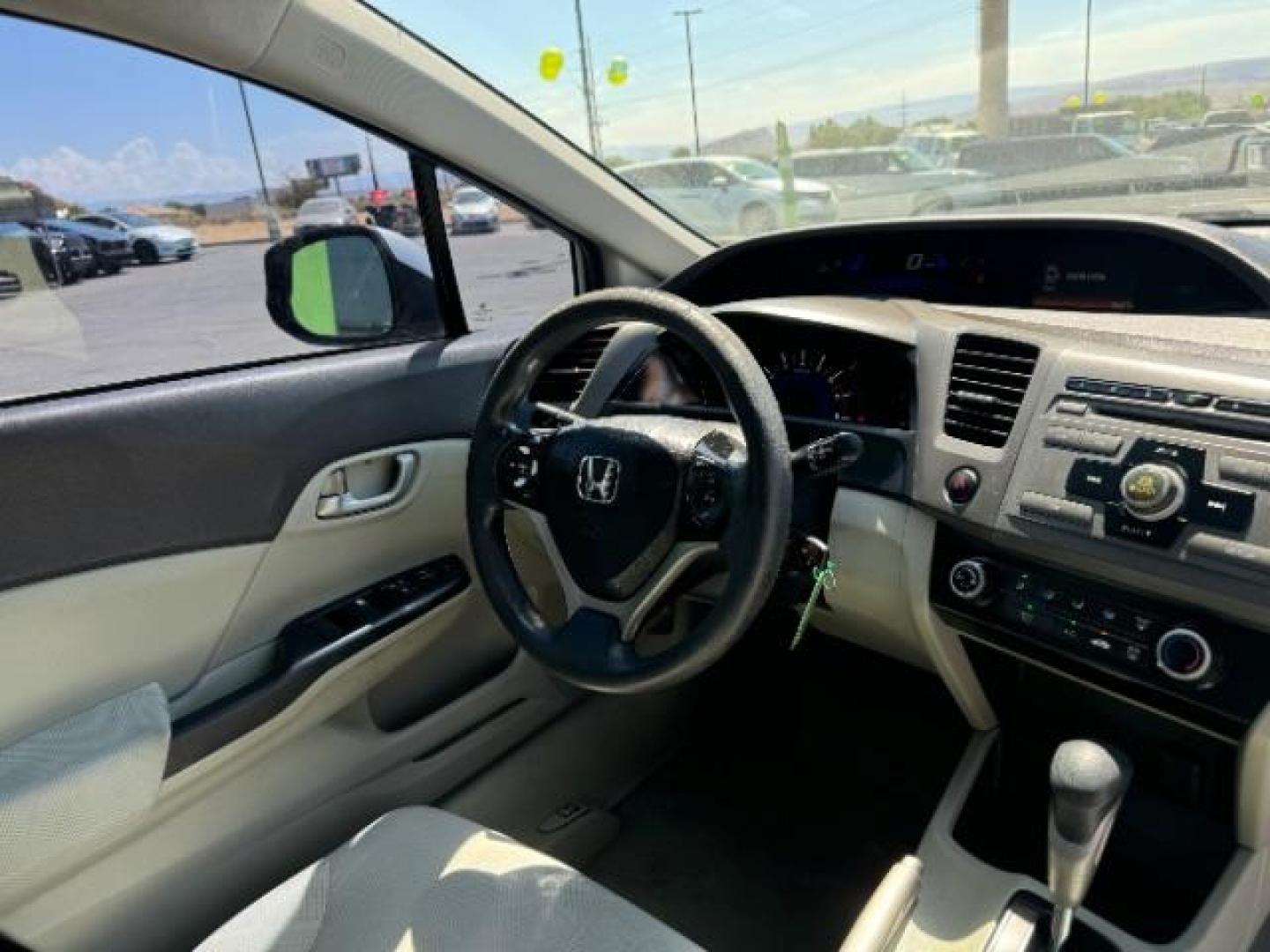 2012 Alabaster Silver Metallic /Gray Cloth Interior Honda Civic LX Sedan 5-Speed AT (2HGFB2F52CH) with an 1.8L L4 SOHC 16V engine, 5-Speed Automatic transmission, located at 1865 East Red Hills Pkwy, St. George, 84770, (435) 628-0023, 37.120850, -113.543640 - We specialize in helping ALL people get the best financing available. No matter your credit score, good, bad or none we can get you an amazing rate. Had a bankruptcy, divorce, or repossessions? We give you the green light to get your credit back on the road. Low down and affordable payments that fit - Photo#30