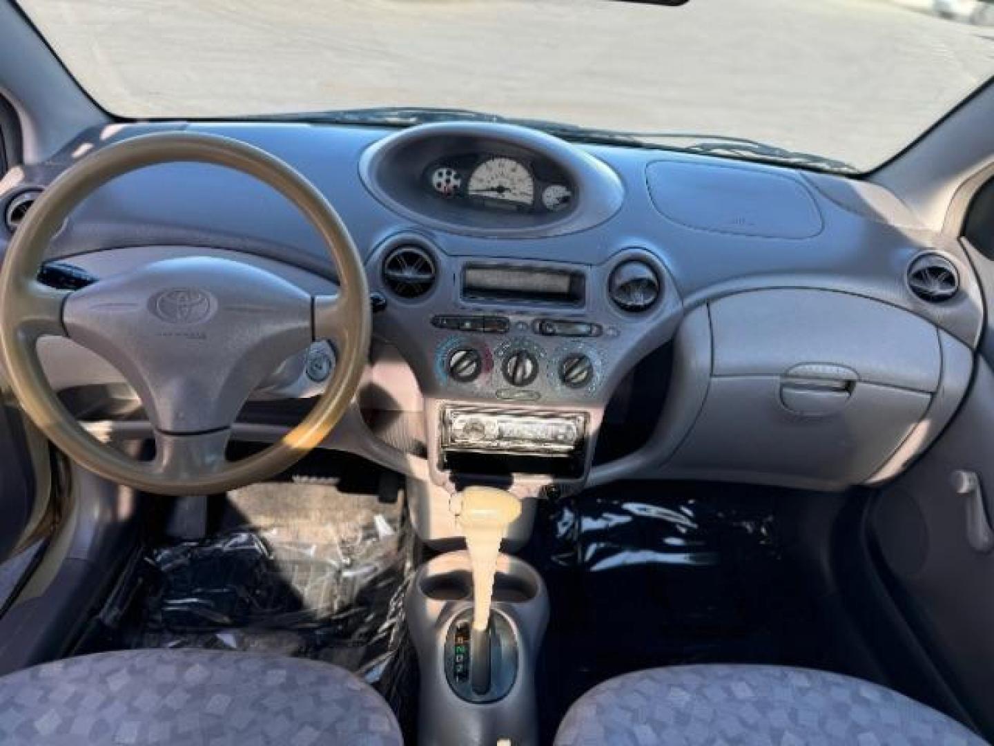 2000 Satin Gold Metallic /Tan Cloth Interior Toyota Echo 2-Door (JTDAT1234Y0) with an 1.5L L4 DOHC 16V engine, Automatic transmission, located at 1865 East Red Hills Pkwy, St. George, 84770, (435) 628-0023, 37.120850, -113.543640 - Photo#11