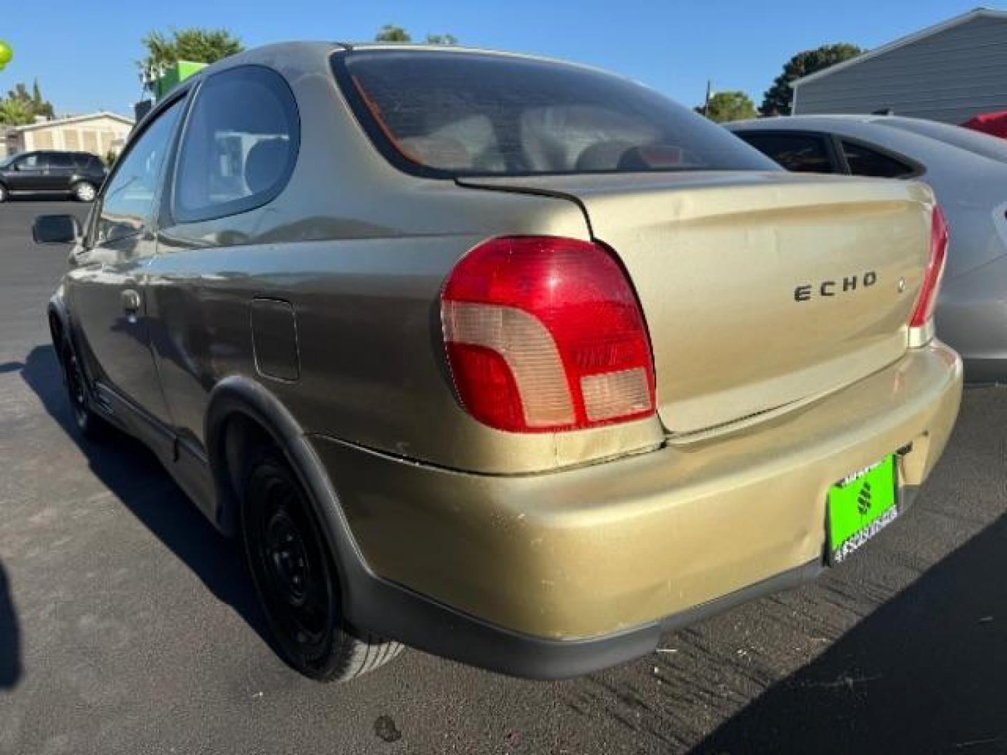 2000 Satin Gold Metallic /Tan Cloth Interior Toyota Echo 2-Door (JTDAT1234Y0) with an 1.5L L4 DOHC 16V engine, Automatic transmission, located at 1865 East Red Hills Pkwy, St. George, 84770, (435) 628-0023, 37.120850, -113.543640 - Photo#3