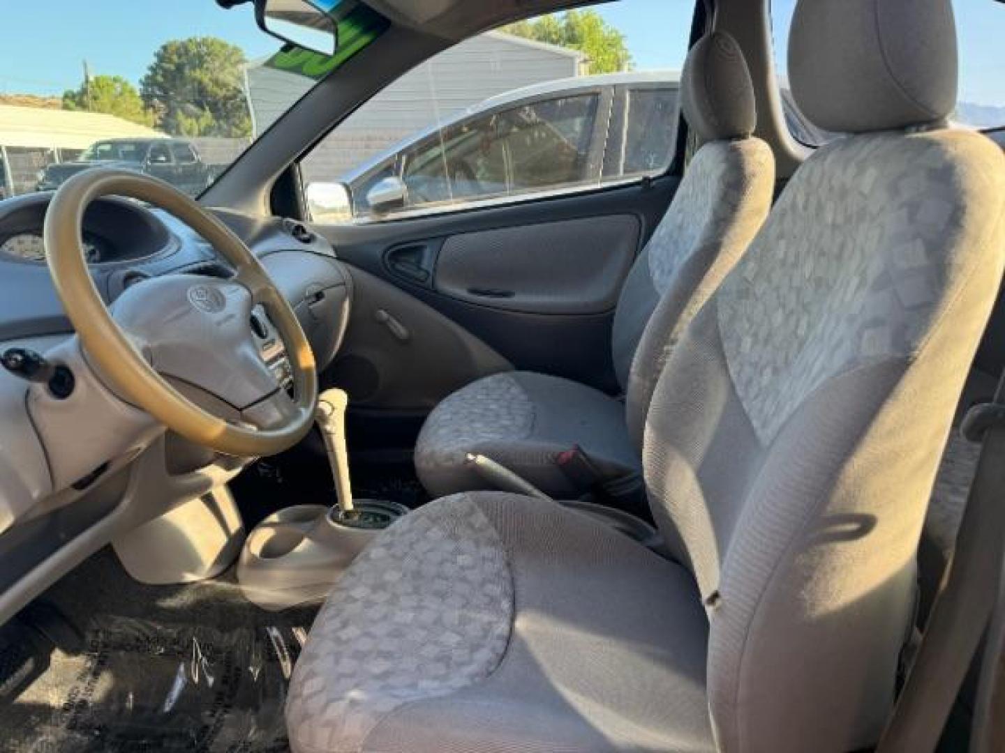 2000 Satin Gold Metallic /Tan Cloth Interior Toyota Echo 2-Door (JTDAT1234Y0) with an 1.5L L4 DOHC 16V engine, Automatic transmission, located at 1865 East Red Hills Pkwy, St. George, 84770, (435) 628-0023, 37.120850, -113.543640 - Photo#6