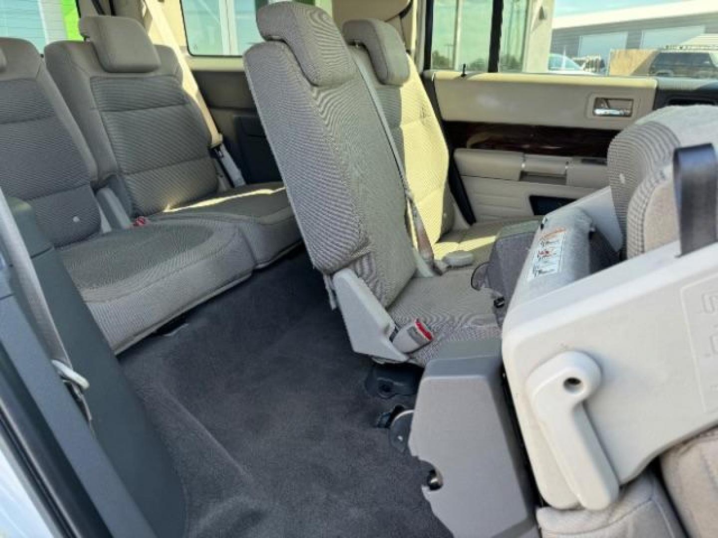 2011 White Suede /Tan Cloth Interior Ford Flex SEL FWD (2FMGK5CC0BB) with an 3.5L V6 DOHC 24V engine, 6-Speed Automatic Overdrive transmission, located at 1865 East Red Hills Pkwy, St. George, 84770, (435) 628-0023, 37.120850, -113.543640 - We specialize in helping ALL people get the best financing available. No matter your credit score, good, bad or none we can get you an amazing rate. Had a bankruptcy, divorce, or repossessions? We give you the green light to get your credit back on the road. Low down and affordable payments that fit - Photo#31