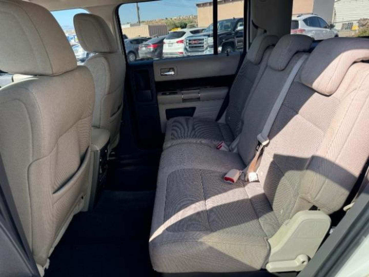 2011 White Suede /Tan Cloth Interior Ford Flex SEL FWD (2FMGK5CC0BB) with an 3.5L V6 DOHC 24V engine, 6-Speed Automatic Overdrive transmission, located at 1865 East Red Hills Pkwy, St. George, 84770, (435) 628-0023, 37.120850, -113.543640 - We specialize in helping ALL people get the best financing available. No matter your credit score, good, bad or none we can get you an amazing rate. Had a bankruptcy, divorce, or repossessions? We give you the green light to get your credit back on the road. Low down and affordable payments that fit - Photo#23