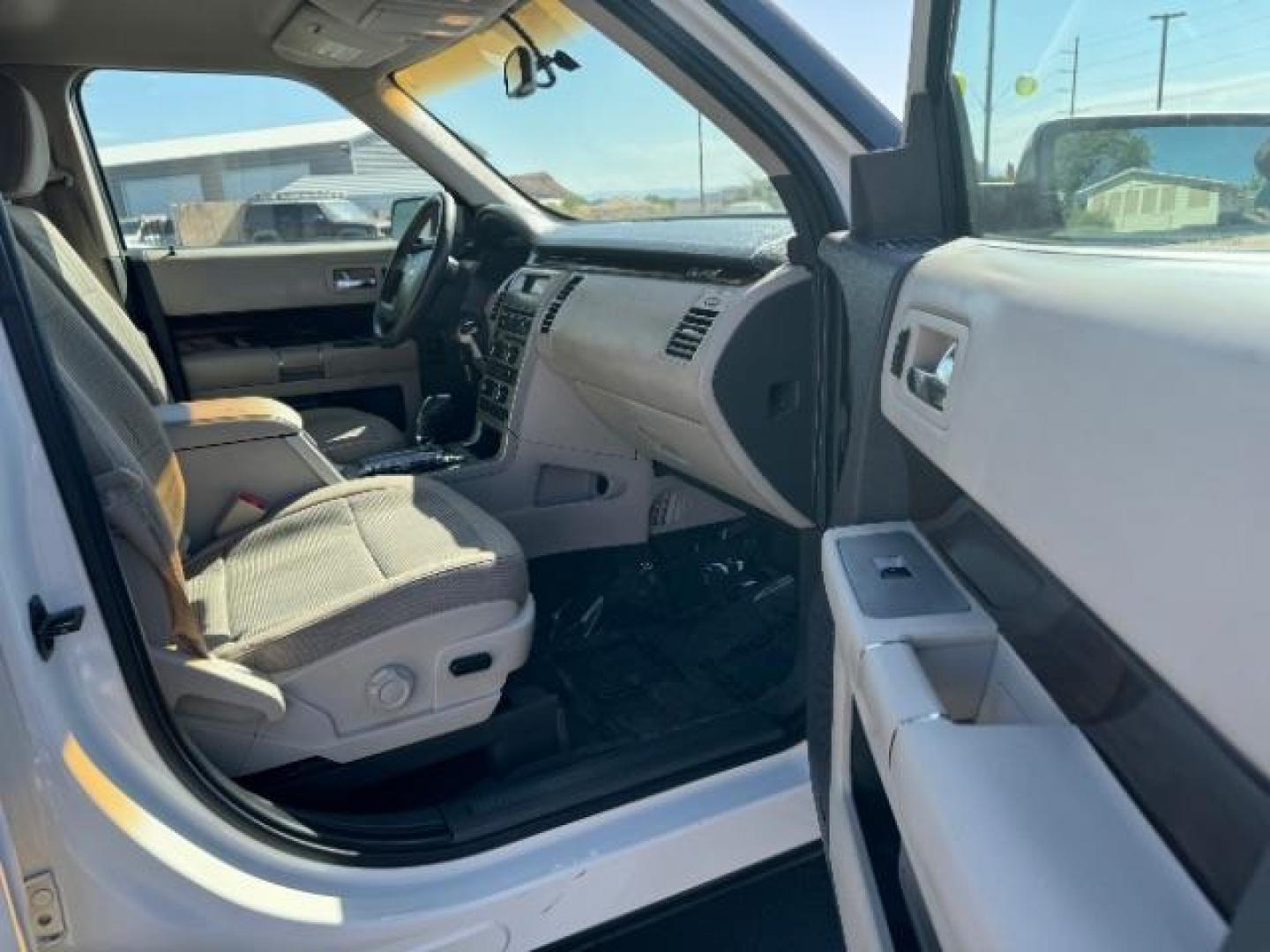 2011 White Suede /Tan Cloth Interior Ford Flex SEL FWD (2FMGK5CC0BB) with an 3.5L V6 DOHC 24V engine, 6-Speed Automatic Overdrive transmission, located at 1865 East Red Hills Pkwy, St. George, 84770, (435) 628-0023, 37.120850, -113.543640 - We specialize in helping ALL people get the best financing available. No matter your credit score, good, bad or none we can get you an amazing rate. Had a bankruptcy, divorce, or repossessions? We give you the green light to get your credit back on the road. Low down and affordable payments that fit - Photo#34