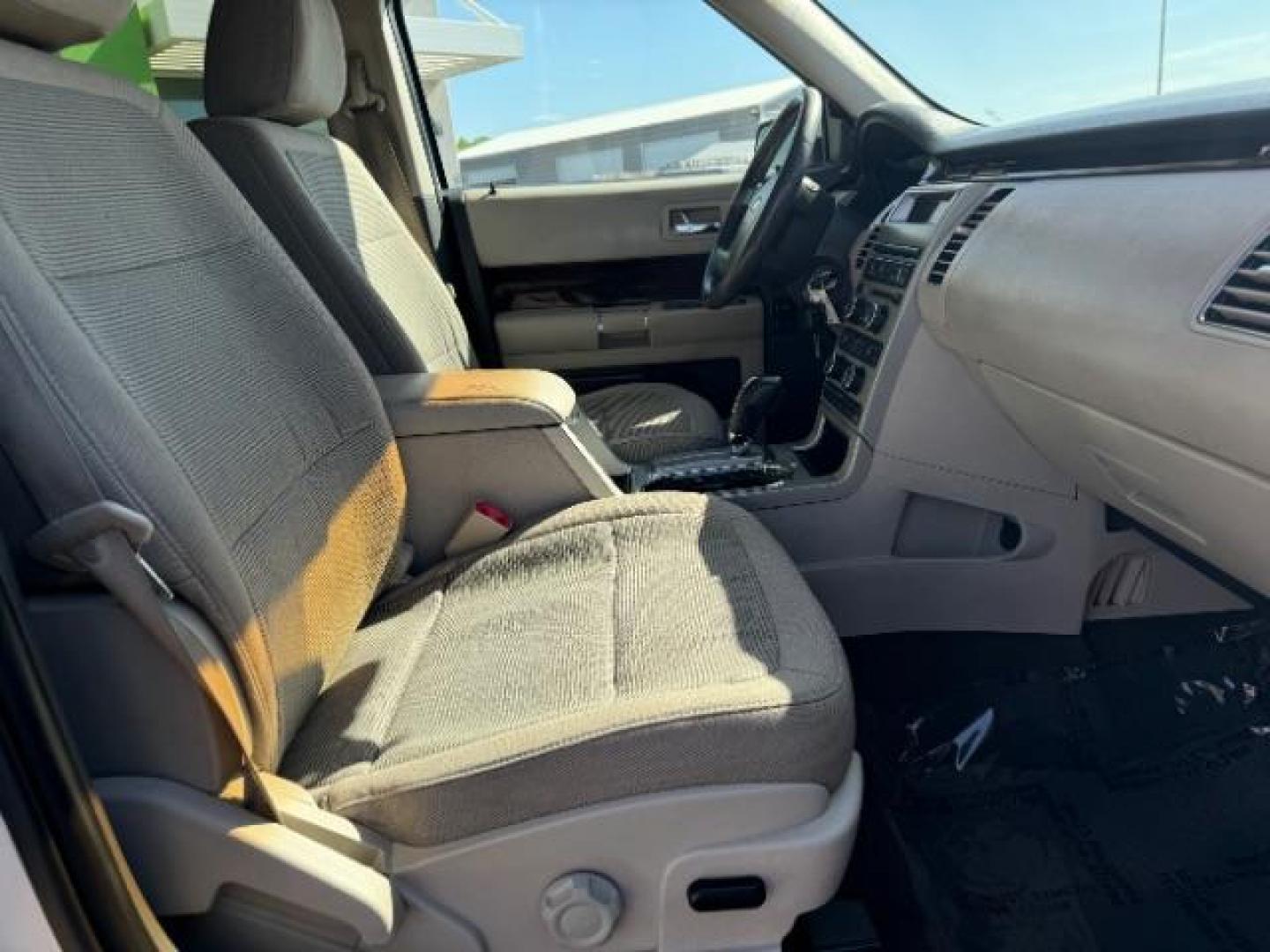 2011 White Suede /Tan Cloth Interior Ford Flex SEL FWD (2FMGK5CC0BB) with an 3.5L V6 DOHC 24V engine, 6-Speed Automatic Overdrive transmission, located at 1865 East Red Hills Pkwy, St. George, 84770, (435) 628-0023, 37.120850, -113.543640 - We specialize in helping ALL people get the best financing available. No matter your credit score, good, bad or none we can get you an amazing rate. Had a bankruptcy, divorce, or repossessions? We give you the green light to get your credit back on the road. Low down and affordable payments that fit - Photo#35