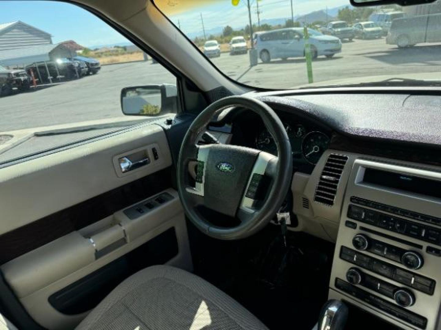 2011 White Suede /Tan Cloth Interior Ford Flex SEL FWD (2FMGK5CC0BB) with an 3.5L V6 DOHC 24V engine, 6-Speed Automatic Overdrive transmission, located at 1865 East Red Hills Pkwy, St. George, 84770, (435) 628-0023, 37.120850, -113.543640 - We specialize in helping ALL people get the best financing available. No matter your credit score, good, bad or none we can get you an amazing rate. Had a bankruptcy, divorce, or repossessions? We give you the green light to get your credit back on the road. Low down and affordable payments that fit - Photo#36