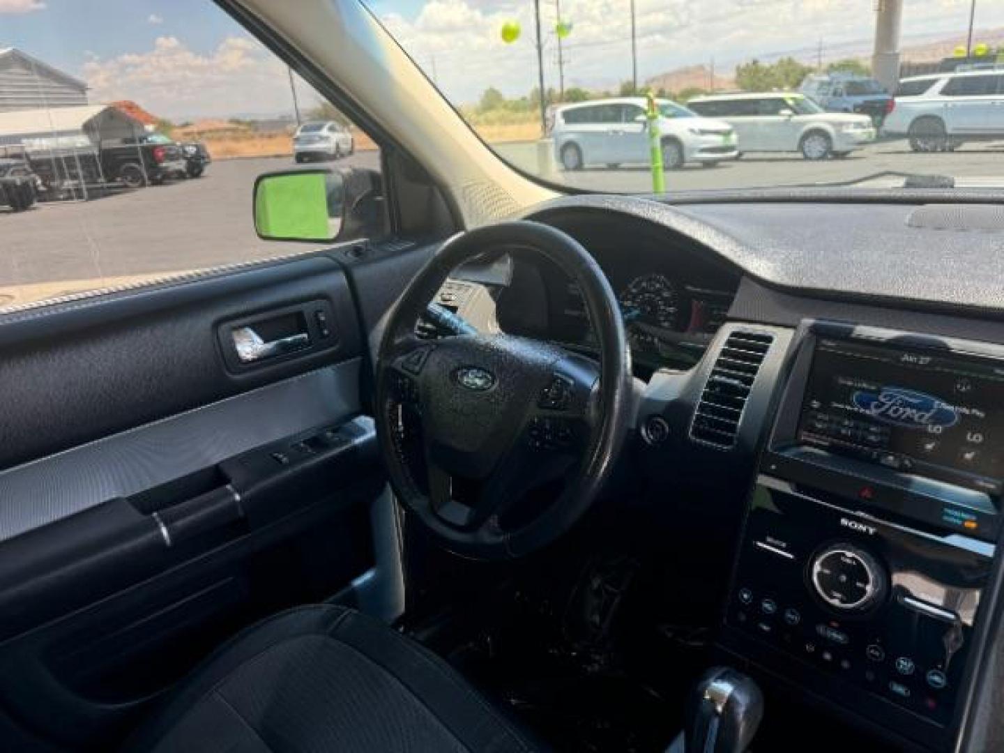 2014 Tuxedo Black Metallic /Charcoal Black w/Gray Ford Flex Limited FWD (2FMGK5D81EB) with an 3.5L V6 DOHC 24V engine, 6-Speed Automatic Overdrive transmission, located at 1865 East Red Hills Pkwy, St. George, 84770, (435) 628-0023, 37.120850, -113.543640 - We specialize in helping ALL people get the best financing available. No matter your credit score, good, bad or none we can get you an amazing rate. Had a bankruptcy, divorce, or repossessions? We give you the green light to get your credit back on the road. Low down and affordable payments that fit - Photo#33