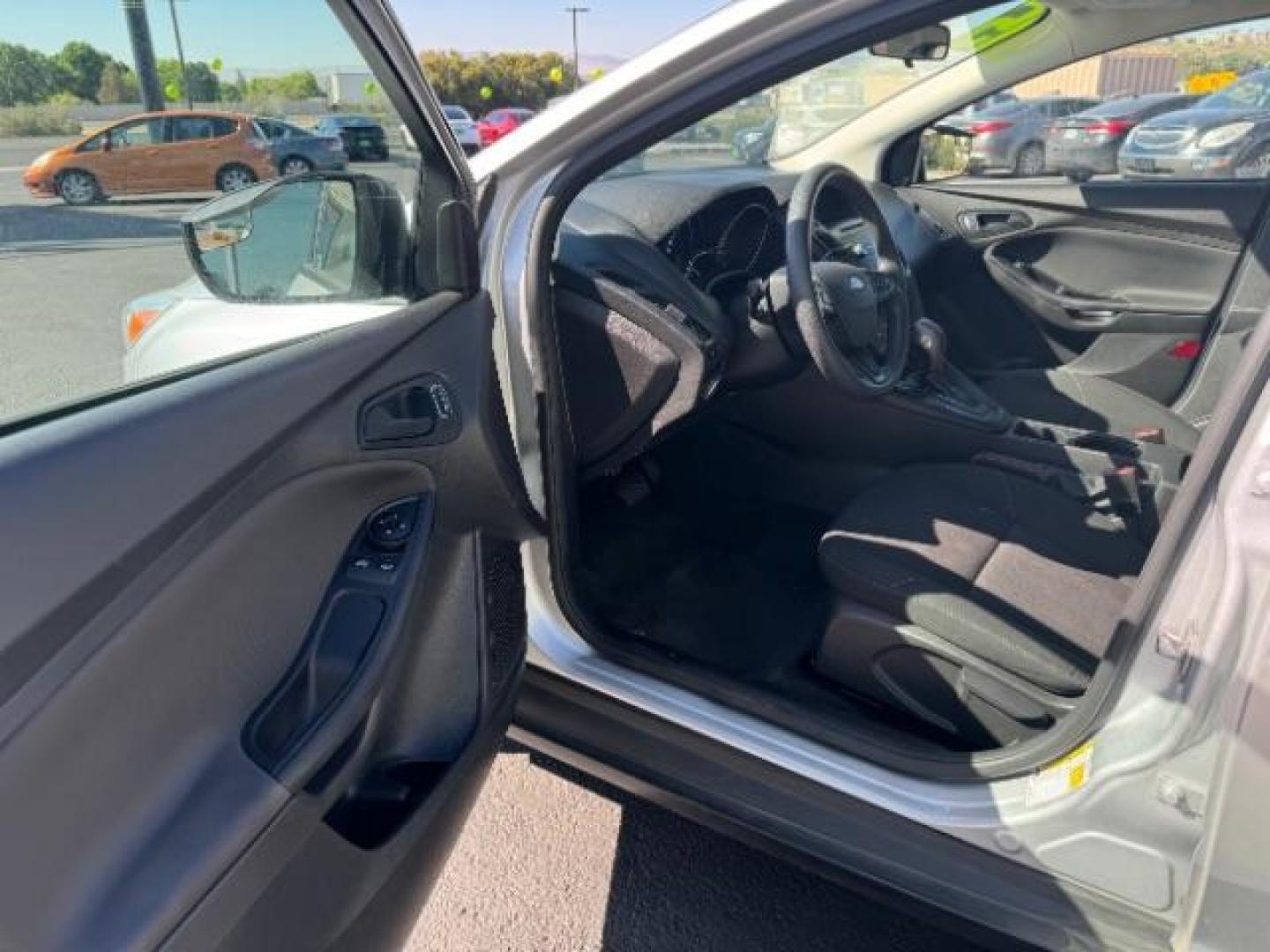 2015 Ingot Silver Metallic /Charcoal Black Insert w/Warm Steel Surround, cloth Ford Focus S Sedan (1FADP3E23FL) with an 2.0L L4 DOHC 16V engine, 5-Speed Manual transmission, located at 1865 East Red Hills Pkwy, St. George, 84770, (435) 628-0023, 37.120850, -113.543640 - Photo#12