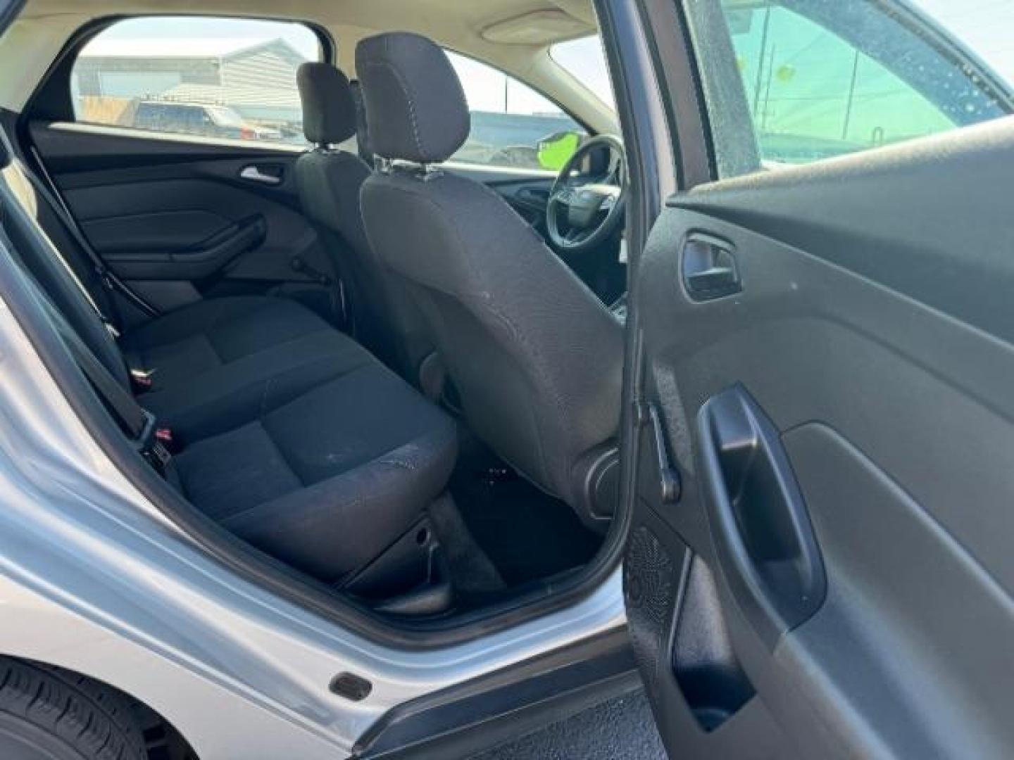 2015 Ingot Silver Metallic /Charcoal Black Insert w/Warm Steel Surround, cloth Ford Focus S Sedan (1FADP3E23FL) with an 2.0L L4 DOHC 16V engine, 5-Speed Manual transmission, located at 1865 East Red Hills Pkwy, St. George, 84770, (435) 628-0023, 37.120850, -113.543640 - Photo#25