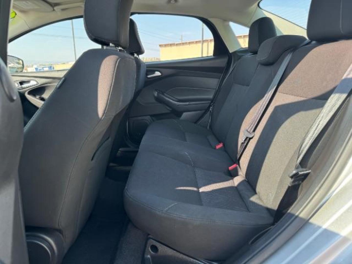 2017 Ingot Silver Metallic /Charcoal Black Insert w/Warm Steel Surround, cloth Ford Focus SEL Sedan (1FADP3H27HL) with an 2.0L L4 DOHC 16V engine, located at 940 North Main Street, Cedar City, UT, 84720, (435) 628-0023, 37.692936, -113.061897 - Photo#24