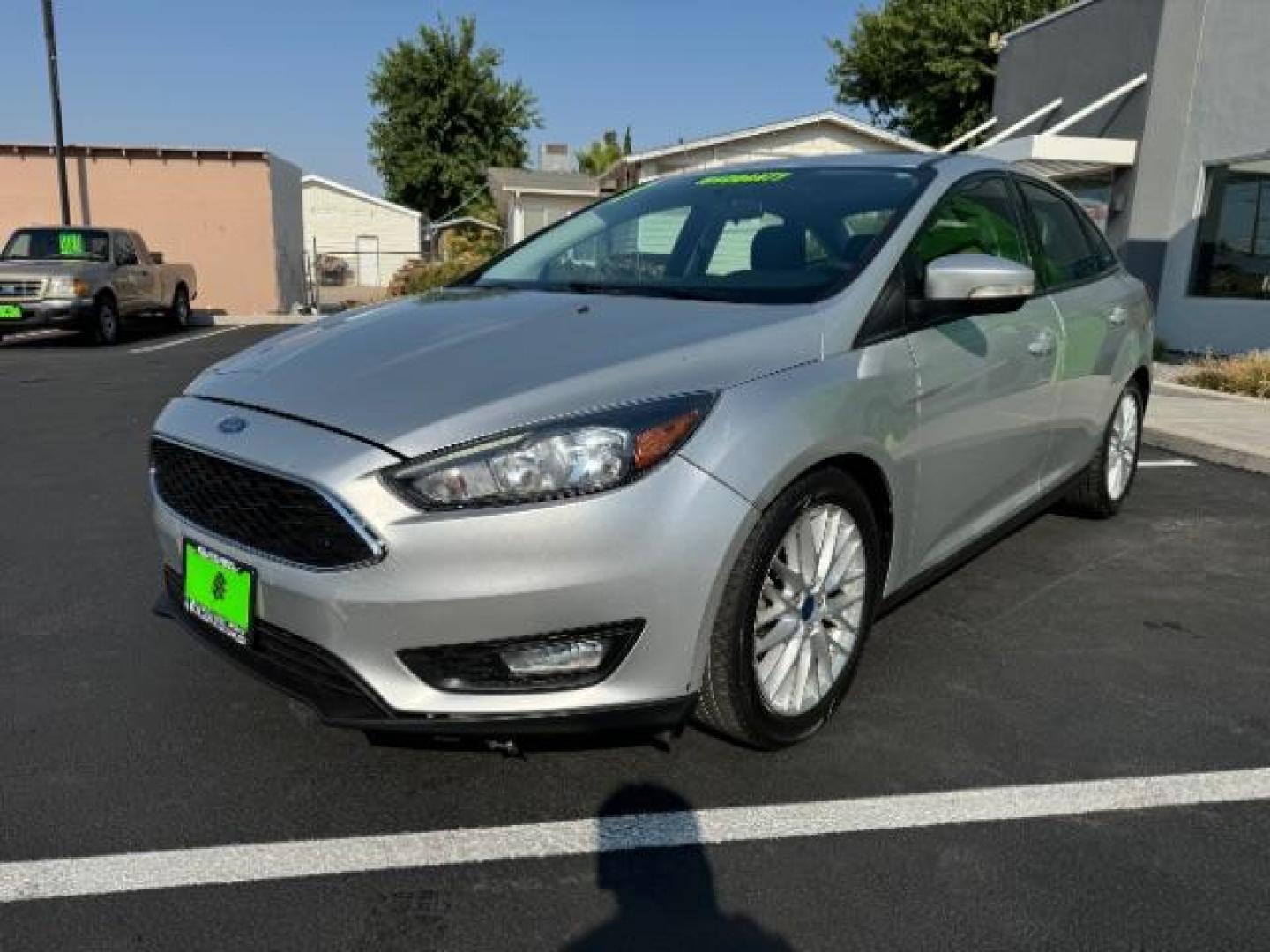 2017 Ingot Silver Metallic /Charcoal Black Insert w/Warm Steel Surround, cloth Ford Focus SEL Sedan (1FADP3H27HL) with an 2.0L L4 DOHC 16V engine, located at 940 North Main Street, Cedar City, UT, 84720, (435) 628-0023, 37.692936, -113.061897 - Photo#2