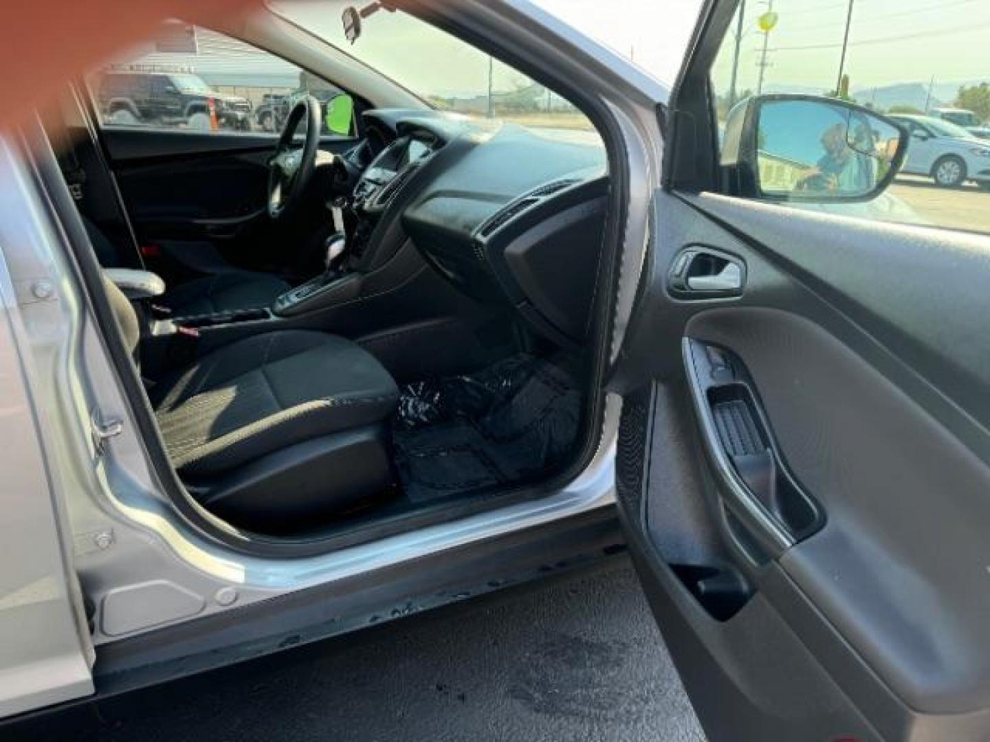 2017 Ingot Silver Metallic /Charcoal Black Insert w/Warm Steel Surround, cloth Ford Focus SEL Sedan (1FADP3H27HL) with an 2.0L L4 DOHC 16V engine, located at 940 North Main Street, Cedar City, UT, 84720, (435) 628-0023, 37.692936, -113.061897 - Photo#31