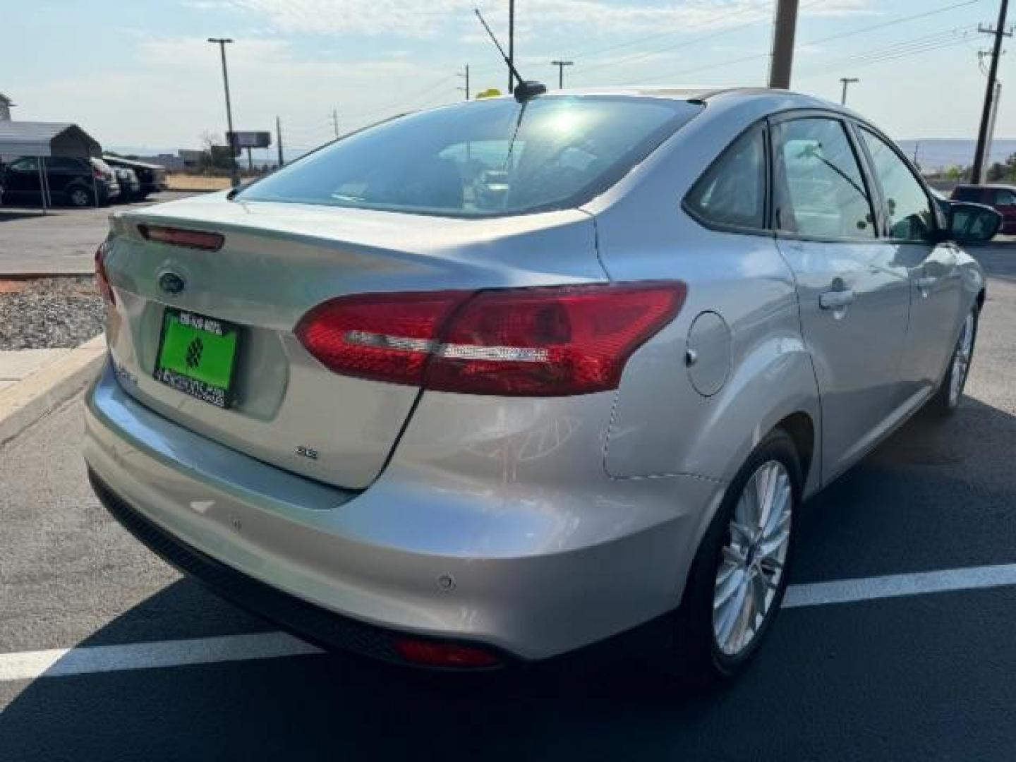 2017 Ingot Silver Metallic /Charcoal Black Insert w/Warm Steel Surround, cloth Ford Focus SEL Sedan (1FADP3H27HL) with an 2.0L L4 DOHC 16V engine, located at 940 North Main Street, Cedar City, UT, 84720, (435) 628-0023, 37.692936, -113.061897 - Photo#6