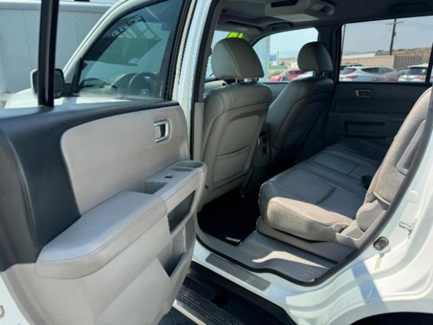 2014 Taffeta White /Black Honda Pilot EX-L 2WD 5-Spd AT with Navigation (5FNYF3H75EB) with an 3.5L V6 SOHC 24V engine, 5-Speed Automatic transmission, located at 940 North Main Street, Cedar City, UT, 84720, (435) 628-0023, 37.692936, -113.061897 - Photo#21