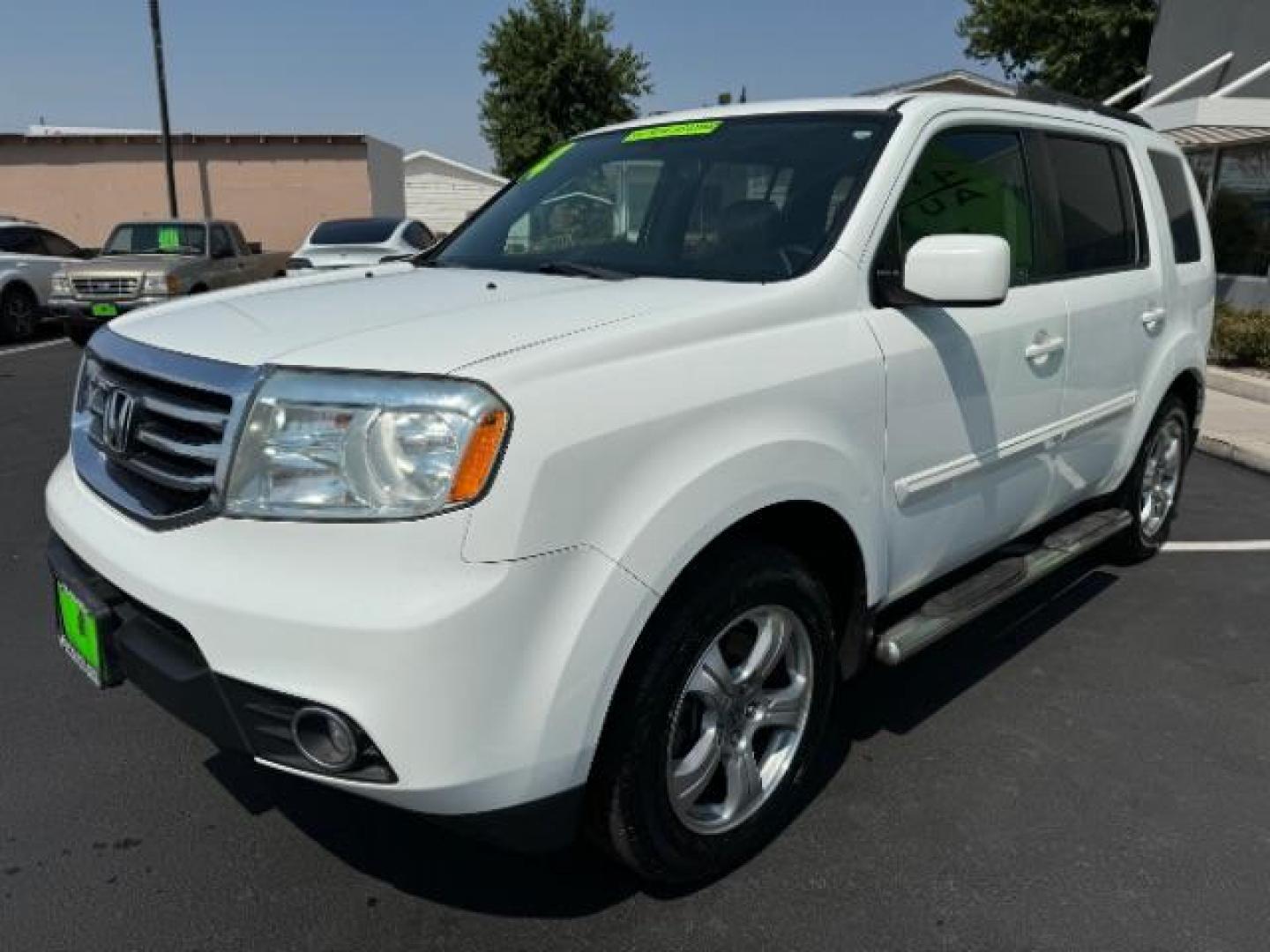 2014 Taffeta White /Black Honda Pilot EX-L 2WD 5-Spd AT with Navigation (5FNYF3H75EB) with an 3.5L V6 SOHC 24V engine, 5-Speed Automatic transmission, located at 940 North Main Street, Cedar City, UT, 84720, (435) 628-0023, 37.692936, -113.061897 - Photo#2