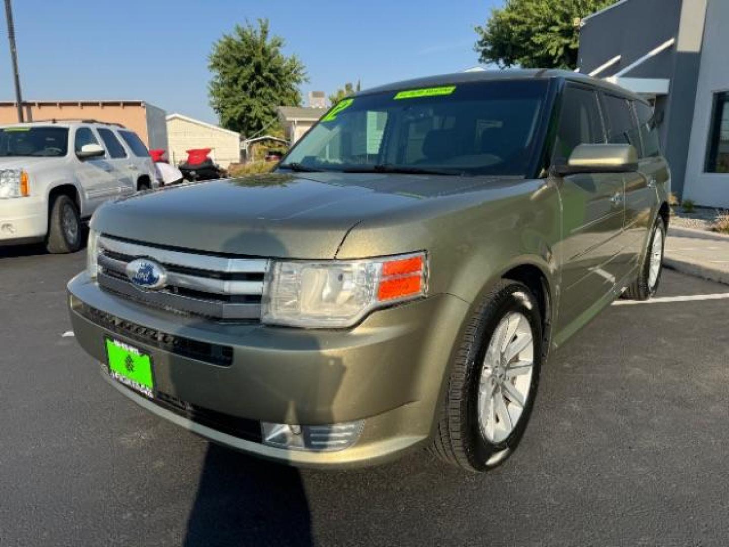 2012 Cinnamon Metallic /Charcoal Black Leather Interior Ford Flex SEL AWD (2FMHK6CC9CB) with an 3.5L V6 DOHC 24V engine, 6-Speed Automatic Overdrive transmission, located at 1865 East Red Hills Pkwy, St. George, 84770, (435) 628-0023, 37.120850, -113.543640 - Photo#2