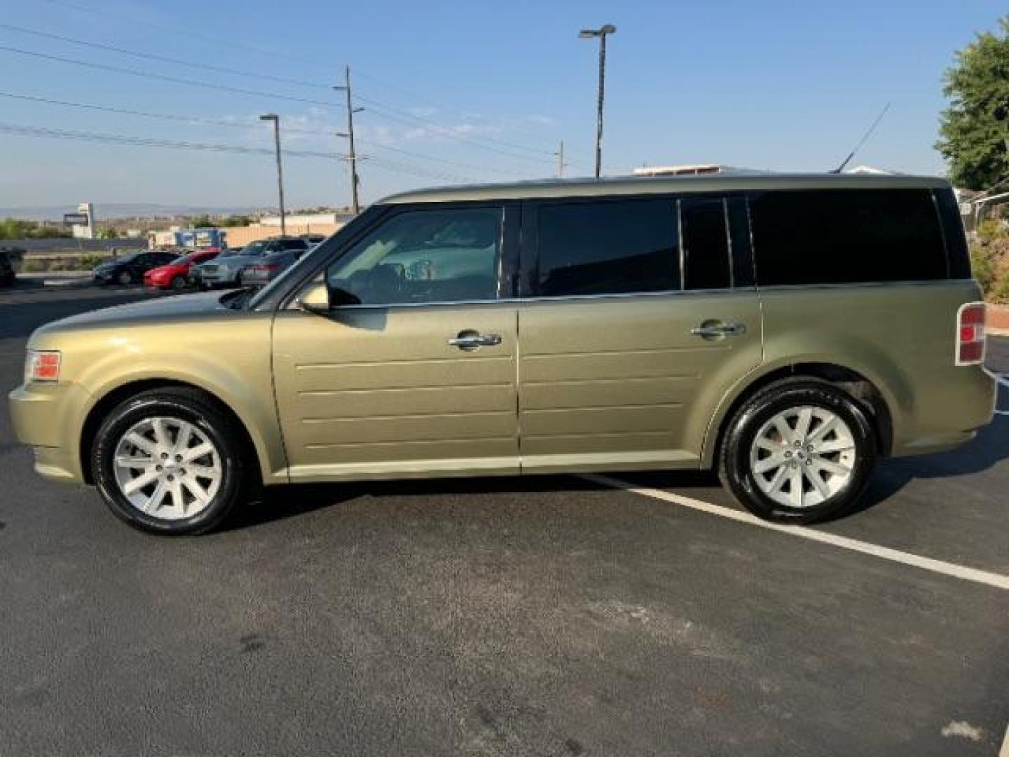 2012 Cinnamon Metallic /Charcoal Black Leather Interior Ford Flex SEL AWD (2FMHK6CC9CB) with an 3.5L V6 DOHC 24V engine, 6-Speed Automatic Overdrive transmission, located at 1865 East Red Hills Pkwy, St. George, 84770, (435) 628-0023, 37.120850, -113.543640 - Photo#3