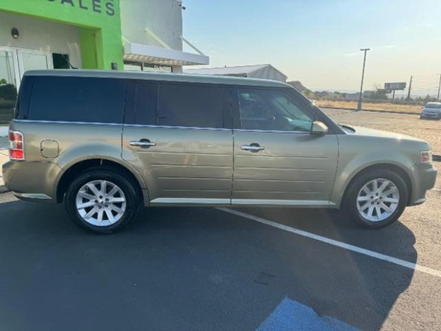 2012 Cinnamon Metallic /Charcoal Black Leather Interior Ford Flex SEL AWD (2FMHK6CC9CB) with an 3.5L V6 DOHC 24V engine, 6-Speed Automatic Overdrive transmission, located at 1865 East Red Hills Pkwy, St. George, 84770, (435) 628-0023, 37.120850, -113.543640 - Photo#7