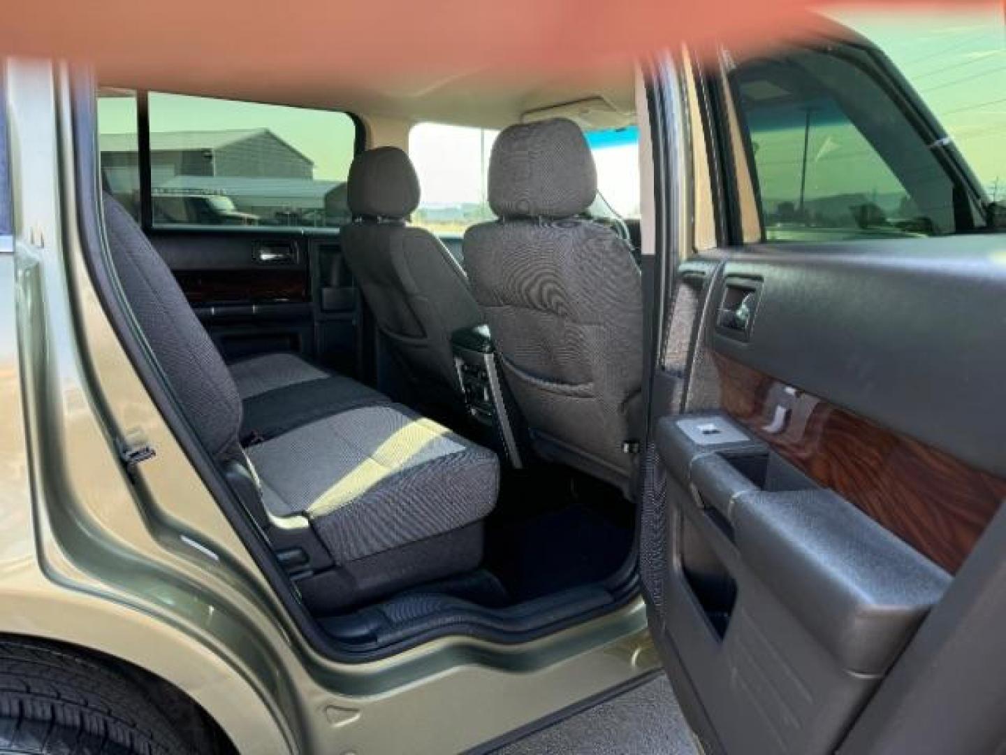 2012 Cinnamon Metallic /Charcoal Black Leather Interior Ford Flex SEL AWD (2FMHK6CC9CB) with an 3.5L V6 DOHC 24V engine, 6-Speed Automatic Overdrive transmission, located at 1865 East Red Hills Pkwy, St. George, 84770, (435) 628-0023, 37.120850, -113.543640 - Photo#30