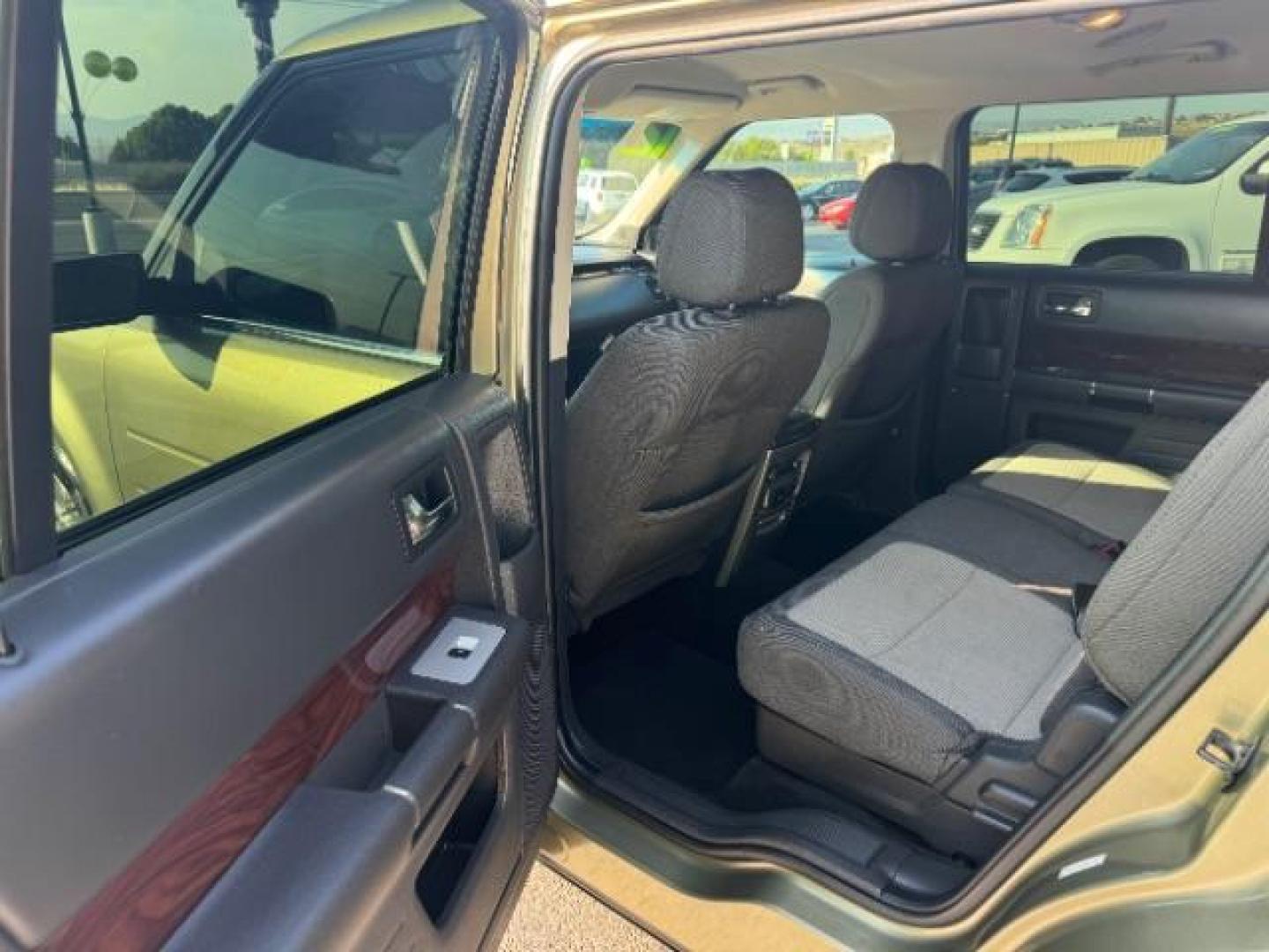 2012 Cinnamon Metallic /Charcoal Black Leather Interior Ford Flex SEL AWD (2FMHK6CC9CB) with an 3.5L V6 DOHC 24V engine, 6-Speed Automatic Overdrive transmission, located at 1865 East Red Hills Pkwy, St. George, 84770, (435) 628-0023, 37.120850, -113.543640 - We specialize in helping ALL people get the best financing available. No matter your credit score, good, bad or none we can get you an amazing rate. Had a bankruptcy, divorce, or repossessions? We give you the green light to get your credit back on the road. Low down and affordable payments that fit - Photo#22