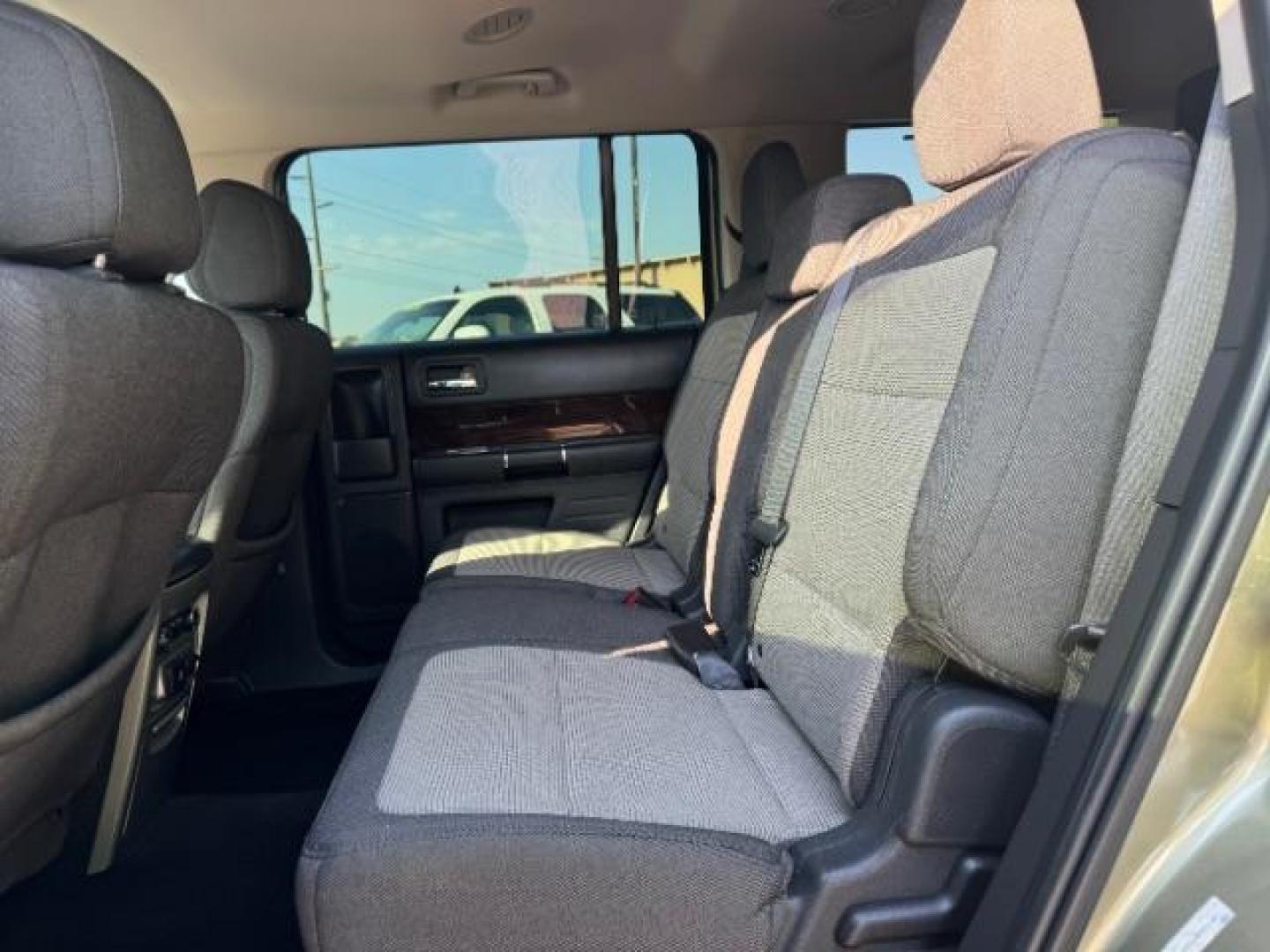 2012 Cinnamon Metallic /Charcoal Black Leather Interior Ford Flex SEL AWD (2FMHK6CC9CB) with an 3.5L V6 DOHC 24V engine, 6-Speed Automatic Overdrive transmission, located at 1865 East Red Hills Pkwy, St. George, 84770, (435) 628-0023, 37.120850, -113.543640 - We specialize in helping ALL people get the best financing available. No matter your credit score, good, bad or none we can get you an amazing rate. Had a bankruptcy, divorce, or repossessions? We give you the green light to get your credit back on the road. Low down and affordable payments that fit - Photo#23