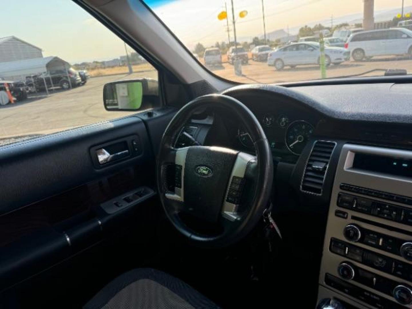 2012 Cinnamon Metallic /Charcoal Black Leather Interior Ford Flex SEL AWD (2FMHK6CC9CB) with an 3.5L V6 DOHC 24V engine, 6-Speed Automatic Overdrive transmission, located at 1865 East Red Hills Pkwy, St. George, 84770, (435) 628-0023, 37.120850, -113.543640 - We specialize in helping ALL people get the best financing available. No matter your credit score, good, bad or none we can get you an amazing rate. Had a bankruptcy, divorce, or repossessions? We give you the green light to get your credit back on the road. Low down and affordable payments that fit - Photo#38