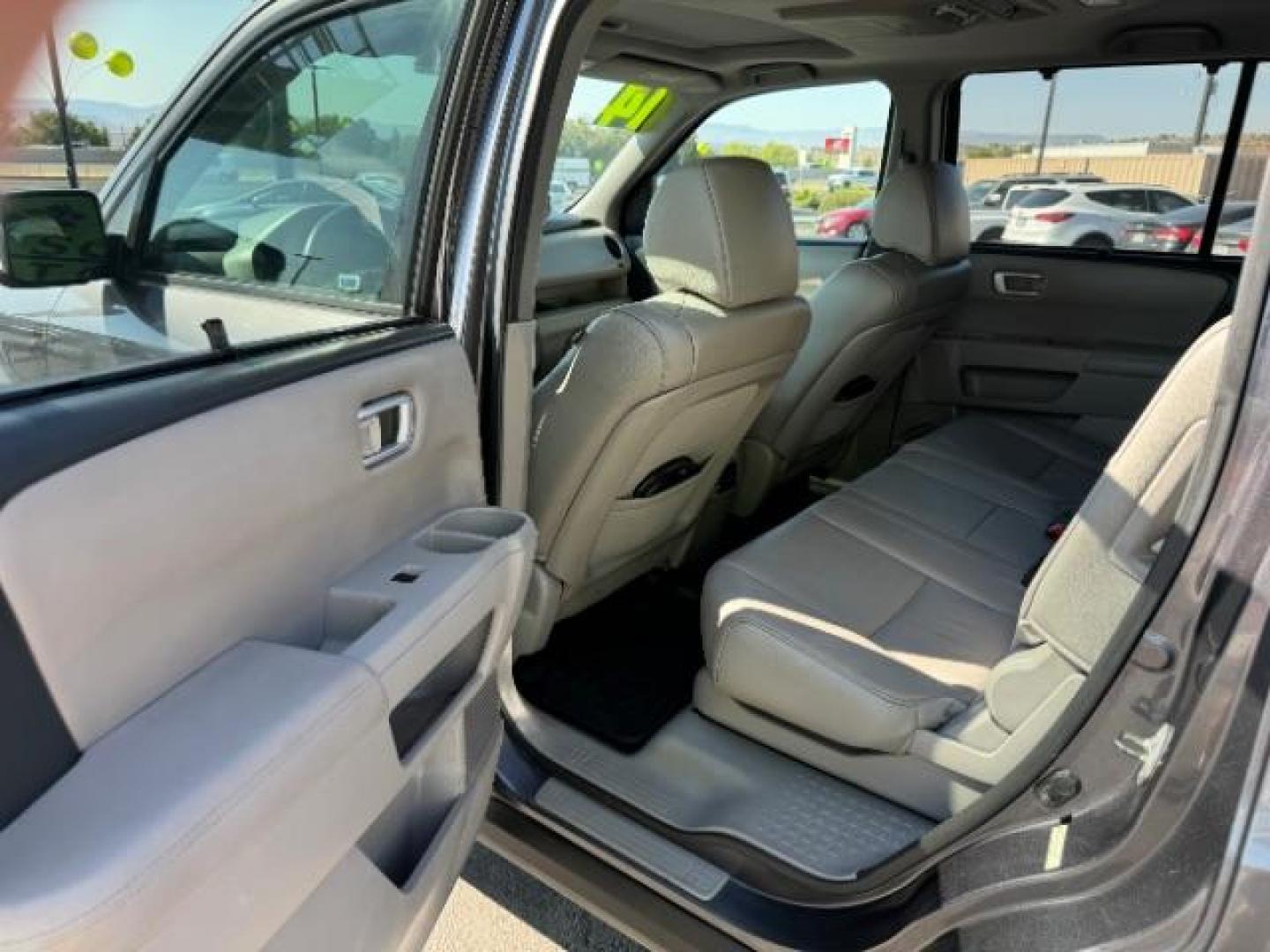 2014 Alabaster Silver Metallic Honda Pilot SPORT UTILITY 4-DR (5FNYF3H97EB) with an 3.5L V6 SOHC 24V engine, 5-Speed Automatic transmission, located at 1865 East Red Hills Pkwy, St. George, 84770, (435) 628-0023, 37.120850, -113.543640 - We specialize in helping ALL people get the best financing available. No matter your credit score, good, bad or none we can get you an amazing rate. Had a bankruptcy, divorce, or repossessions? We give you the green light to get your credit back on the road. Low down and affordable payments that fit - Photo#23