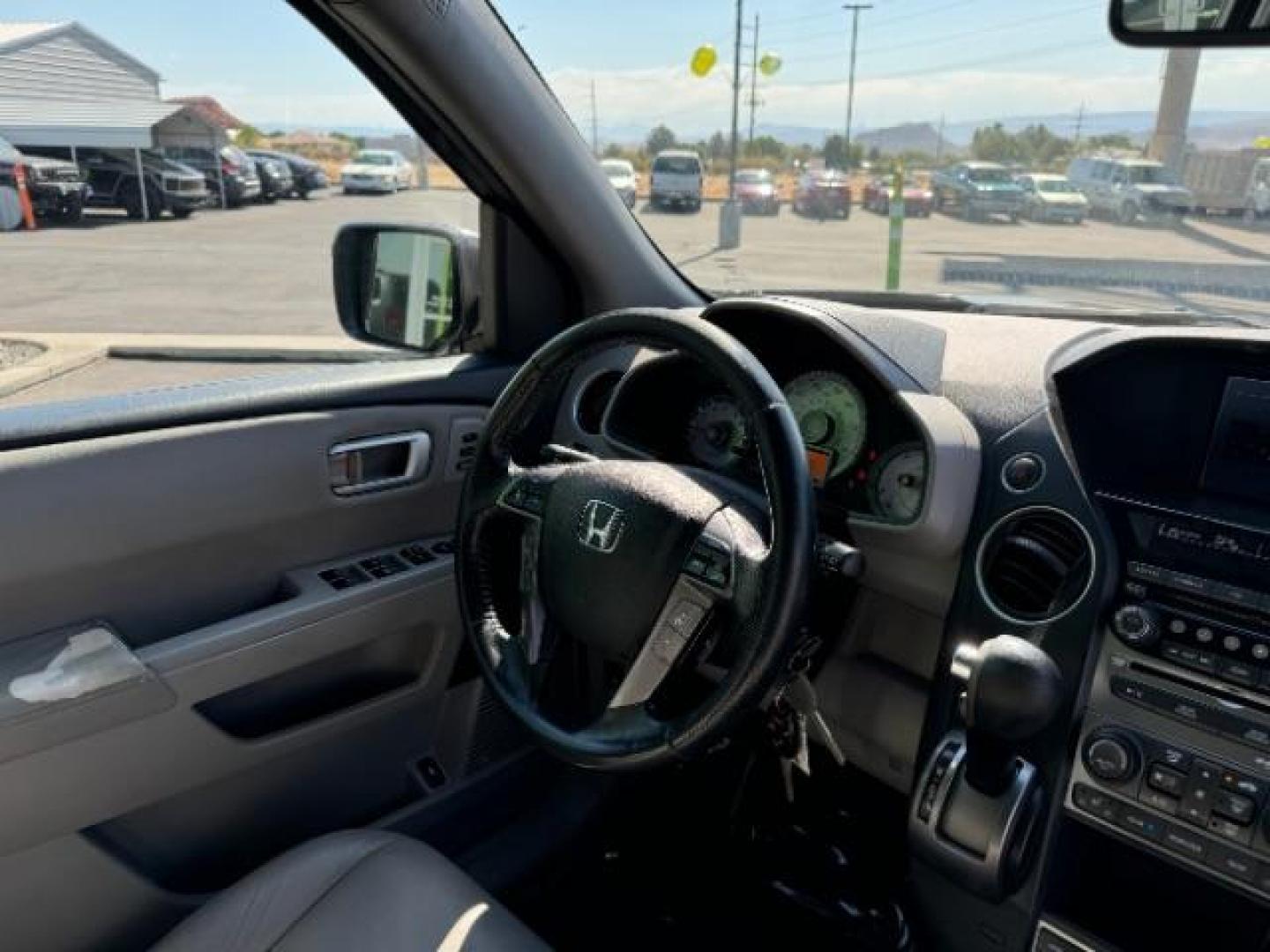 2014 Alabaster Silver Metallic Honda Pilot SPORT UTILITY 4-DR (5FNYF3H97EB) with an 3.5L V6 SOHC 24V engine, 5-Speed Automatic transmission, located at 1865 East Red Hills Pkwy, St. George, 84770, (435) 628-0023, 37.120850, -113.543640 - We specialize in helping ALL people get the best financing available. No matter your credit score, good, bad or none we can get you an amazing rate. Had a bankruptcy, divorce, or repossessions? We give you the green light to get your credit back on the road. Low down and affordable payments that fit - Photo#42