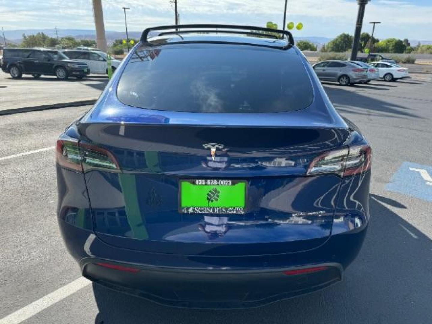 2020 Deep Blue Metallic /All Black, leatherette Tesla Model Y Long Range (5YJYGDEE2LF) with an ELECTRIC engine, 1-Speed Automatic transmission, located at 1865 East Red Hills Pkwy, St. George, 84770, (435) 628-0023, 37.120850, -113.543640 - Beautiful Long Range AWD Model Y. Excellent condition with 120k mile warranty on battery and motor. Tires are great, has roof rack, Battery still gets 285 on full charge (93% of original). ***May qualify for $4,000 EV cashback rebate*** We are setup with the IRS to directly file credit and recieve - Photo#5