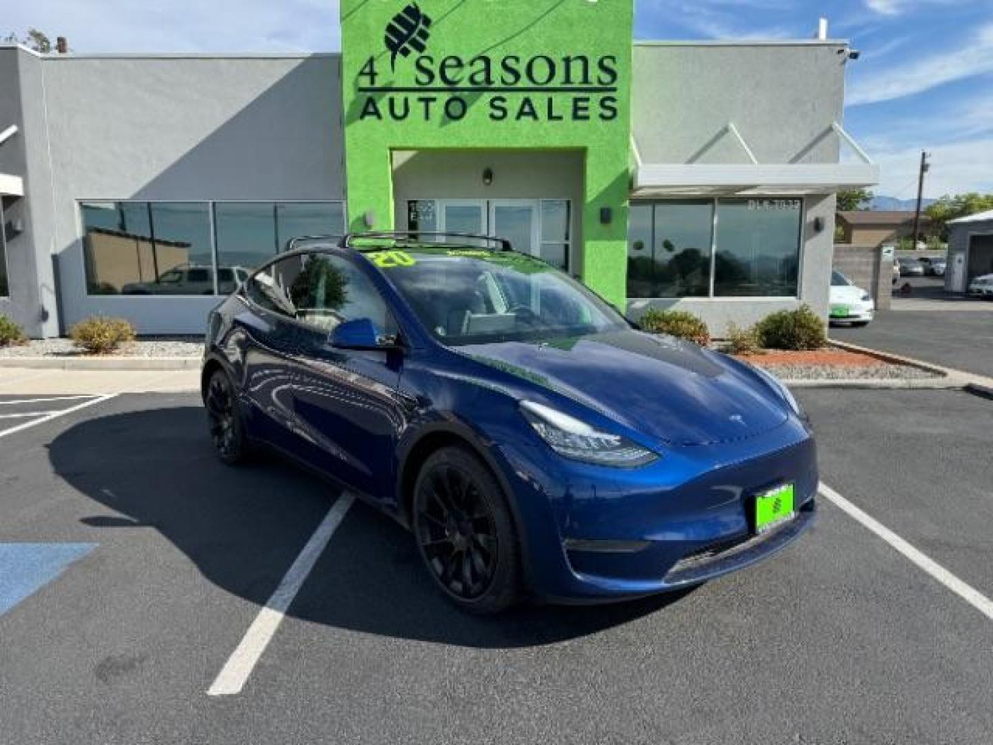 2020 Deep Blue Metallic /All Black, leatherette Tesla Model Y Long Range (5YJYGDEE2LF) with an ELECTRIC engine, 1-Speed Automatic transmission, located at 1865 East Red Hills Pkwy, St. George, 84770, (435) 628-0023, 37.120850, -113.543640 - Beautiful Long Range AWD Model Y. Excellent condition with 120k mile warranty on battery and motor. Tires are great, has roof rack, Battery still gets 285 on full charge (93% of original). ***May qualify for $4,000 EV cashback rebate*** We are setup with the IRS to directly file credit and recieve - Photo#0