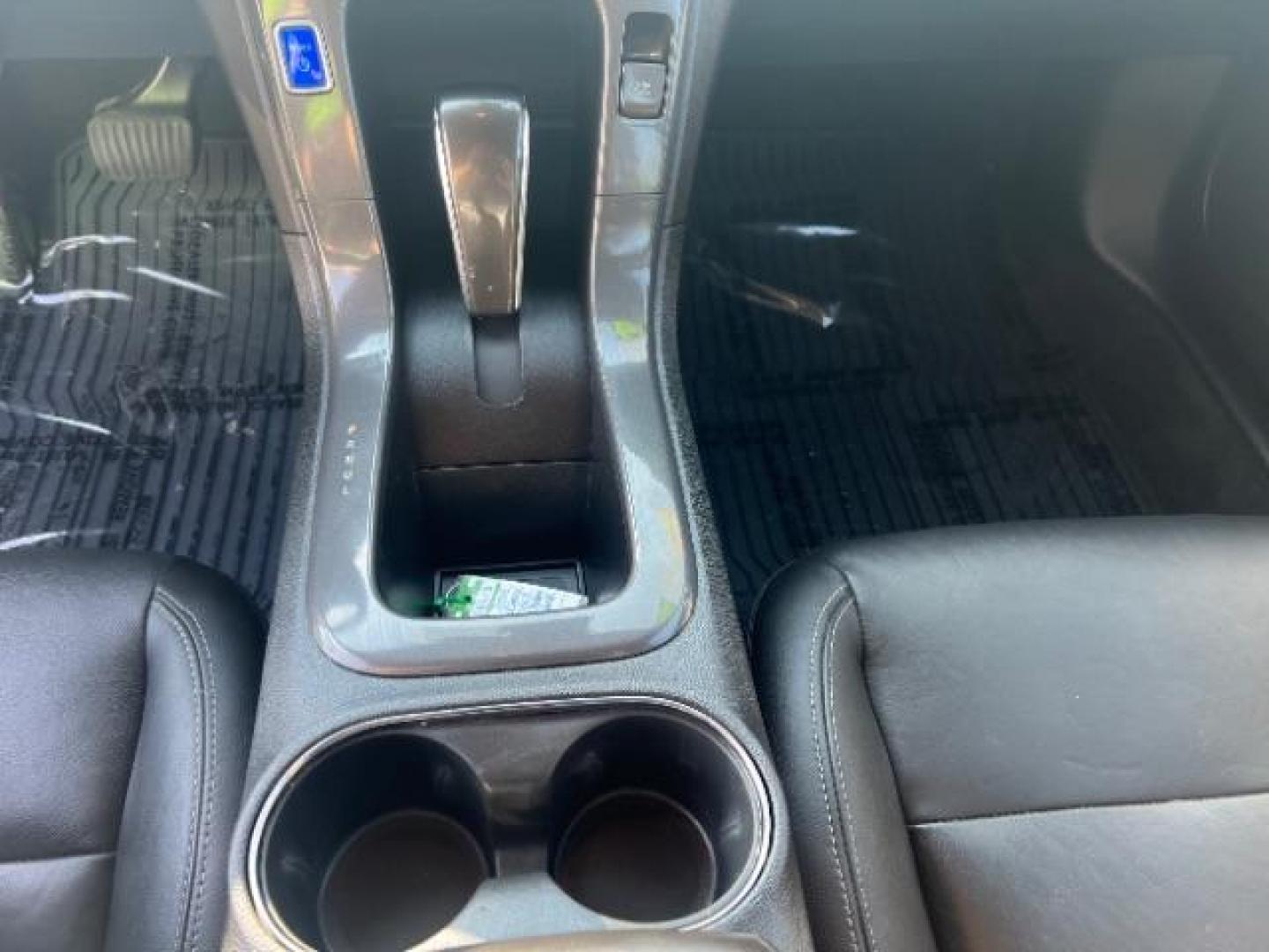 2014 Black /Black Interior Chevrolet Volt Premium w/ LEP (1G1RF6E41EU) with an 1.4L L4 DOHC 16V PLUG-IN HYBRID engine, Continuously Variable Transmission transmission, located at 940 North Main Street, Cedar City, UT, 84720, (435) 628-0023, 37.692936, -113.061897 - ***This vehicle qualifies for the EV/Hybrid tax rebate of up to $4,000*** We are setup with the IRS to recieve direct payments within 72 hours. We file the rebate online with IRS and can credit it to your down payment, reduce the sales price OR give you cashback!! These cars will not last and can o - Photo#22