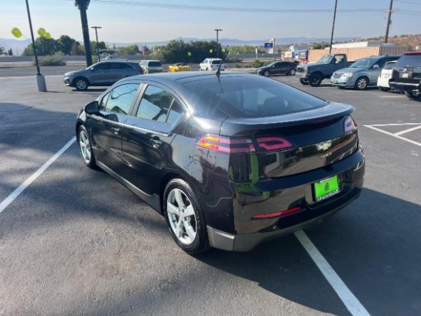 2014 Black /Black Interior Chevrolet Volt Premium w/ LEP (1G1RF6E41EU) with an 1.4L L4 DOHC 16V PLUG-IN HYBRID engine, Continuously Variable Transmission transmission, located at 940 North Main Street, Cedar City, UT, 84720, (435) 628-0023, 37.692936, -113.061897 - ***This vehicle qualifies for the EV/Hybrid tax rebate of up to $4,000*** We are setup with the IRS to recieve direct payments within 72 hours. We file the rebate online with IRS and can credit it to your down payment, reduce the sales price OR give you cashback!! These cars will not last and can o - Photo#4