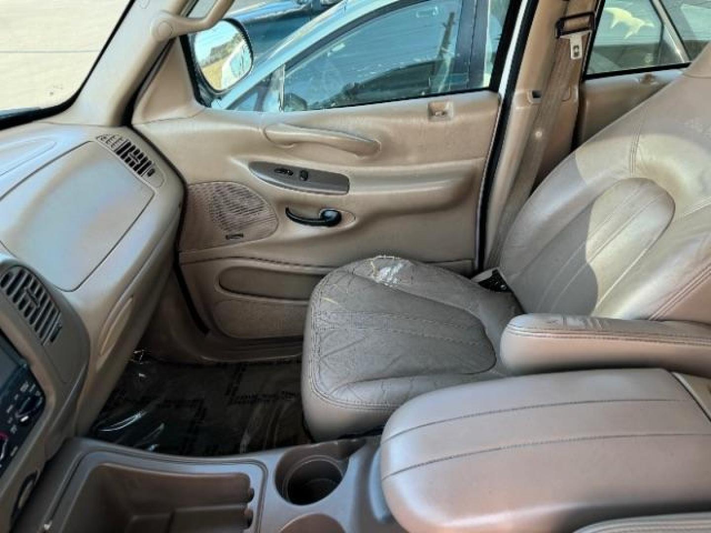 1998 Oxford White Clearcoat /Medium Prairie Tan Leather Ford Expedition Eddie Bauer 4WD (1FMPU18L6WL) with an 5.4L V8 SOHC 16V engine, 4-Speed Automatic transmission, located at 1865 East Red Hills Pkwy, St. George, 84770, (435) 628-0023, 37.120850, -113.543640 - Photo#8