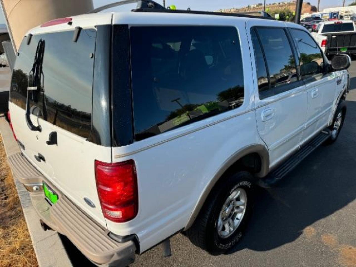 1998 Oxford White Clearcoat /Medium Prairie Tan Leather Ford Expedition Eddie Bauer 4WD (1FMPU18L6WL) with an 5.4L V8 SOHC 16V engine, 4-Speed Automatic transmission, located at 1865 East Red Hills Pkwy, St. George, 84770, (435) 628-0023, 37.120850, -113.543640 - This vehicle is a Mechanic Special. This means it will need some love. Runs a drives fine but has body damage, leaks or other mechanical issues. It did NOT pass our 50 point inspection. Get a great deal on a less than perfect car. These cars do NOT qualify for our in house financing. Cash and carry, - Photo#4