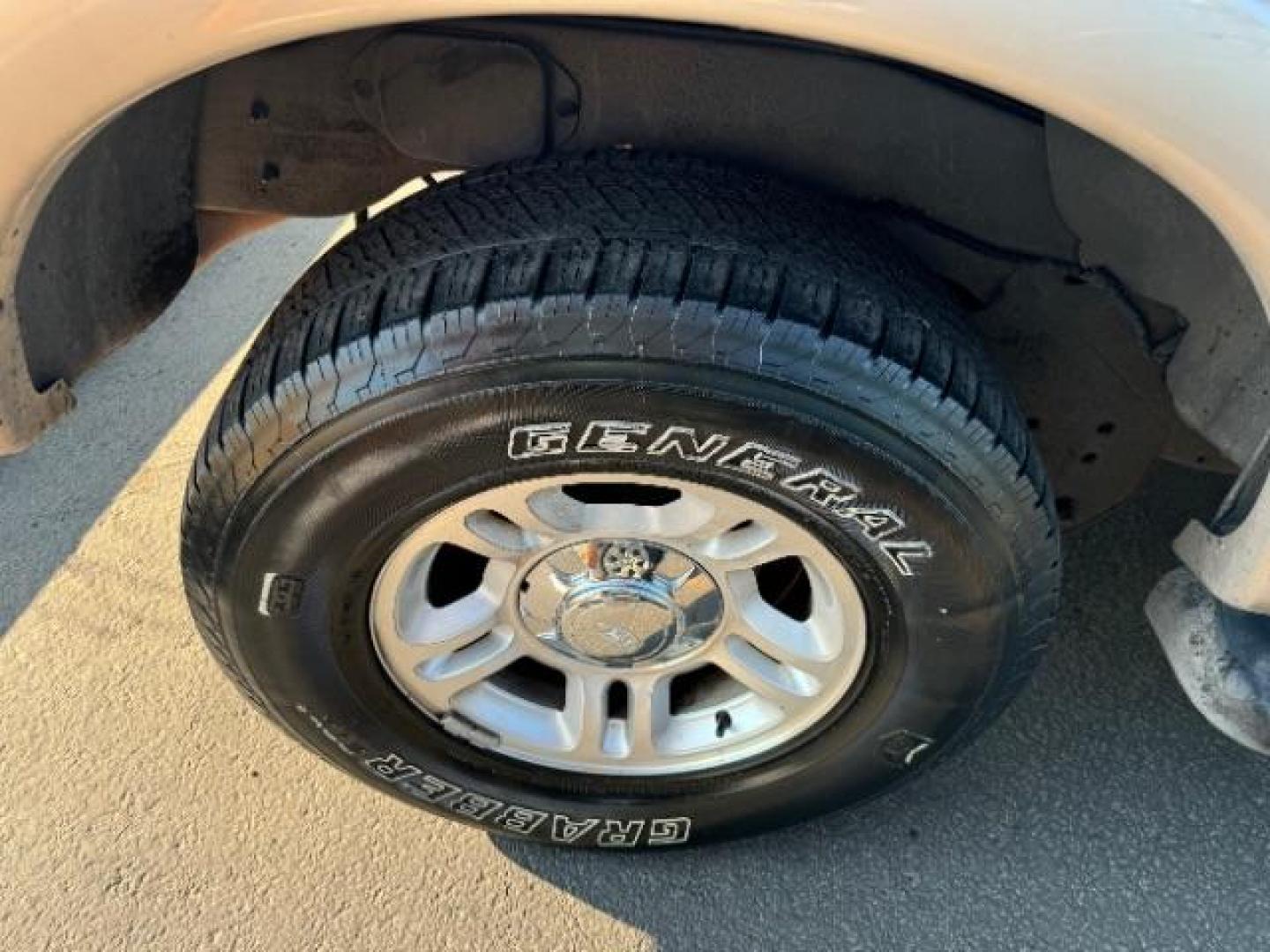 1998 Oxford White Clearcoat /Medium Prairie Tan Leather Ford Expedition Eddie Bauer 4WD (1FMPU18L6WL) with an 5.4L V8 SOHC 16V engine, 4-Speed Automatic transmission, located at 1865 East Red Hills Pkwy, St. George, 84770, (435) 628-0023, 37.120850, -113.543640 - This vehicle is a Mechanic Special. This means it will need some love. Runs a drives fine but has body damage, leaks or other mechanical issues. It did NOT pass our 50 point inspection. Get a great deal on a less than perfect car. These cars do NOT qualify for our in house financing. Cash and carry, - Photo#5