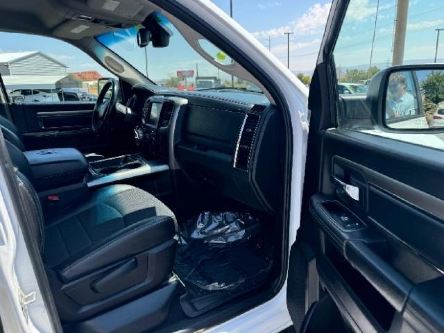 2016 Bright White Clear Coat /Black, leather RAM 1500 Sport Quad Cab 4WD (1C6RR7HT2GS) with an 5.7L V8 OHV 16V engine, 8-Speed Automatic transmission, located at 940 North Main Street, Cedar City, UT, 84720, (435) 628-0023, 37.692936, -113.061897 - We specialize in helping ALL people get the best financing available. No matter your credit score, good, bad or none we can get you an amazing rate. Had a bankruptcy, divorce, or repossessions? We give you the green light to get your credit back on the road. Low down and affordable payments that fit - Photo#28