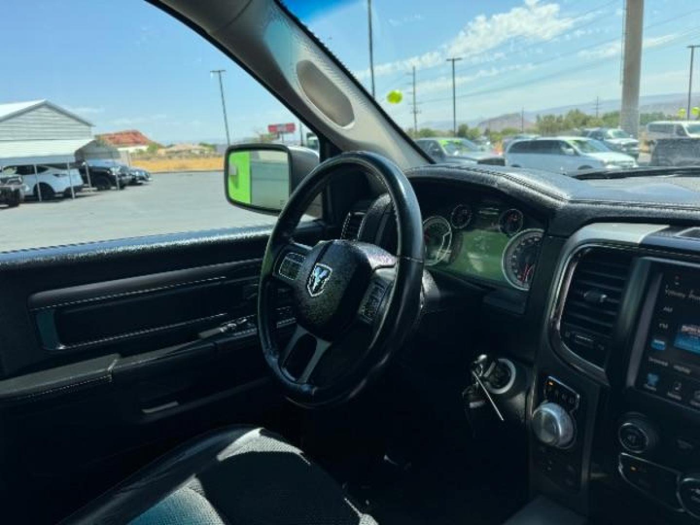 2016 Bright White Clear Coat /Black, leather RAM 1500 Sport Quad Cab 4WD (1C6RR7HT2GS) with an 5.7L V8 OHV 16V engine, 8-Speed Automatic transmission, located at 1865 East Red Hills Pkwy, St. George, 84770, (435) 628-0023, 37.120850, -113.543640 - We specialize in helping ALL people get the best financing available. No matter your credit score, good, bad or none we can get you an amazing rate. Had a bankruptcy, divorce, or repossessions? We give you the green light to get your credit back on the road. Low down and affordable payments that fit - Photo#30