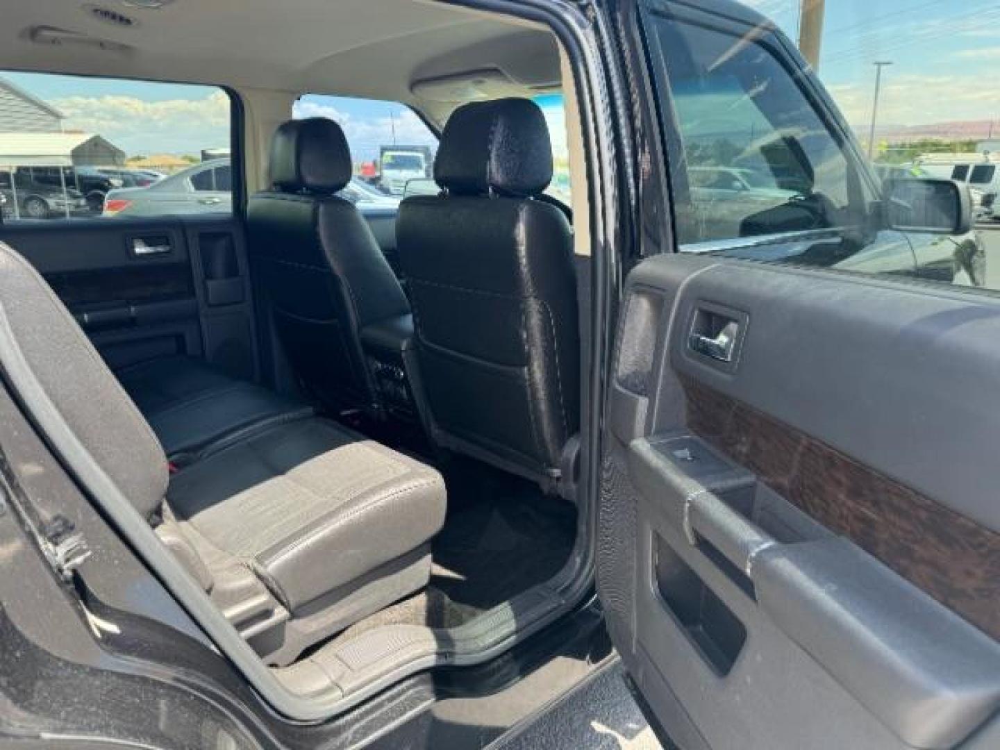 2015 Tuxedo Black Metallic /Charcoal Black, leather Ford Flex Limited FWD (2FMGK5D84FB) with an 3.5L V6 DOHC 24V engine, 6-Speed Automatic Overdrive transmission, located at 940 North Main Street, Cedar City, UT, 84720, (435) 628-0023, 37.692936, -113.061897 - We specialize in helping ALL people get the best financing available. No matter your credit score, good, bad or none we can get you an amazing rate. Had a bankruptcy, divorce, or repossessions? We give you the green light to get your credit back on the road. Low down and affordable payments that fit - Photo#30