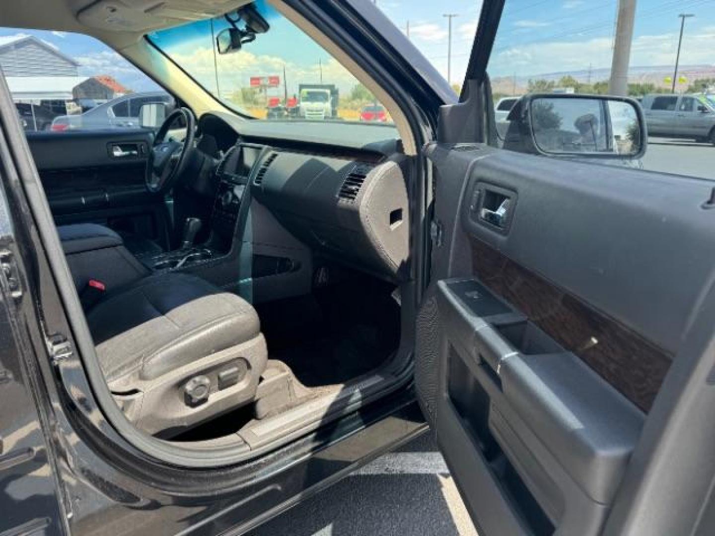 2015 Tuxedo Black Metallic /Charcoal Black, leather Ford Flex Limited FWD (2FMGK5D84FB) with an 3.5L V6 DOHC 24V engine, 6-Speed Automatic Overdrive transmission, located at 940 North Main Street, Cedar City, UT, 84720, (435) 628-0023, 37.692936, -113.061897 - We specialize in helping ALL people get the best financing available. No matter your credit score, good, bad or none we can get you an amazing rate. Had a bankruptcy, divorce, or repossessions? We give you the green light to get your credit back on the road. Low down and affordable payments that fit - Photo#34