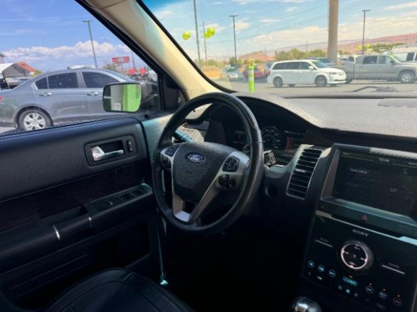 2015 Tuxedo Black Metallic /Charcoal Black, leather Ford Flex Limited FWD (2FMGK5D84FB) with an 3.5L V6 DOHC 24V engine, 6-Speed Automatic Overdrive transmission, located at 940 North Main Street, Cedar City, UT, 84720, (435) 628-0023, 37.692936, -113.061897 - We specialize in helping ALL people get the best financing available. No matter your credit score, good, bad or none we can get you an amazing rate. Had a bankruptcy, divorce, or repossessions? We give you the green light to get your credit back on the road. Low down and affordable payments that fit - Photo#38