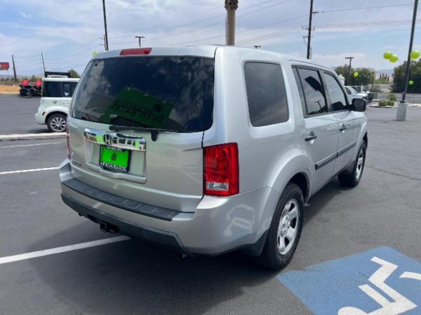 2011 Alabaster Silver Metallic /Gray Cloth Interior Honda Pilot LX 2WD 5-Spd AT (5FNYF3H23BB) with an 3.5L V6 SOHC 24V engine, 5-Speed Automatic transmission, located at 1865 East Red Hills Pkwy, St. George, 84770, (435) 628-0023, 37.120850, -113.543640 - Photo#6