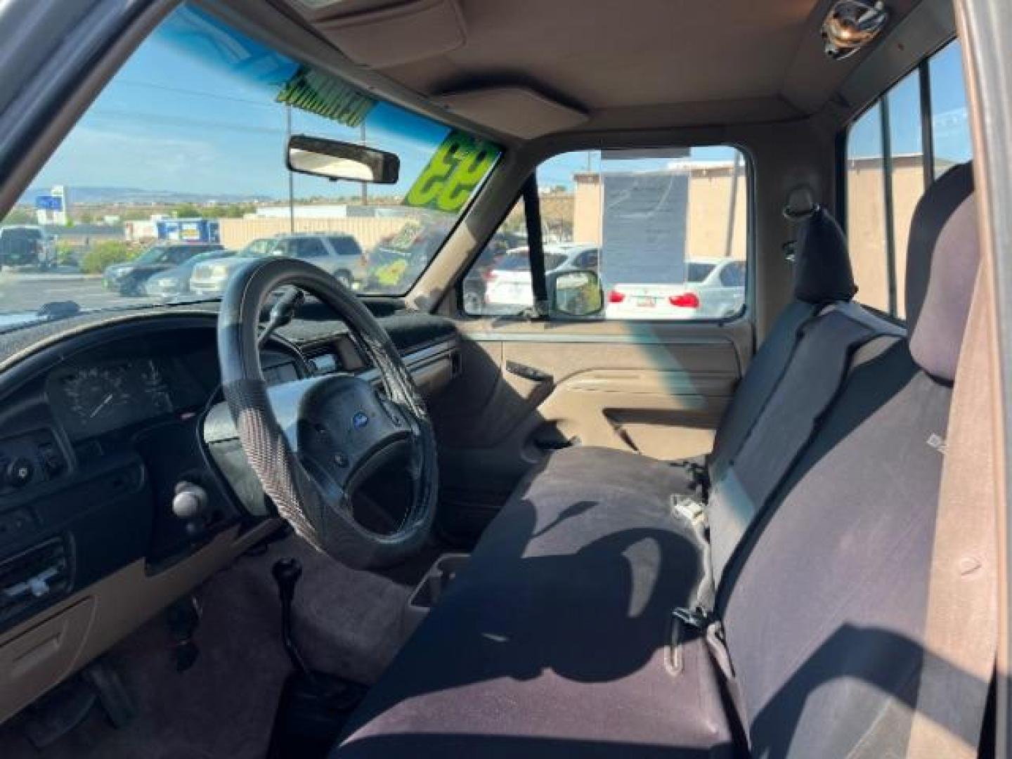 1993 Grey /Tan Cloth Interior Ford F-150 S Reg. Cab Long Bed 4WD (1FTEF14N2PL) with an 5.0L V8 OHV 16V engine, 4-Speed Automatic transmission, located at 1865 East Red Hills Pkwy, St. George, 84770, (435) 628-0023, 37.120850, -113.543640 - We specialize in helping ALL people get the best financing available. No matter your credit score, good, bad or none we can get you an amazing rate. Had a bankruptcy, divorce, or repossessions? We give you the green light to get your credit back on the road. Low down and affordable payments that fit - Photo#13