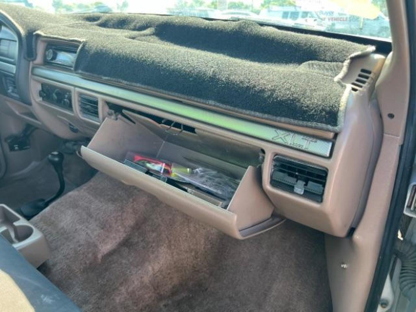 1993 Grey /Tan Cloth Interior Ford F-150 S Reg. Cab Long Bed 4WD (1FTEF14N2PL) with an 5.0L V8 OHV 16V engine, 4-Speed Automatic transmission, located at 1865 East Red Hills Pkwy, St. George, 84770, (435) 628-0023, 37.120850, -113.543640 - We specialize in helping ALL people get the best financing available. No matter your credit score, good, bad or none we can get you an amazing rate. Had a bankruptcy, divorce, or repossessions? We give you the green light to get your credit back on the road. Low down and affordable payments that fit - Photo#24