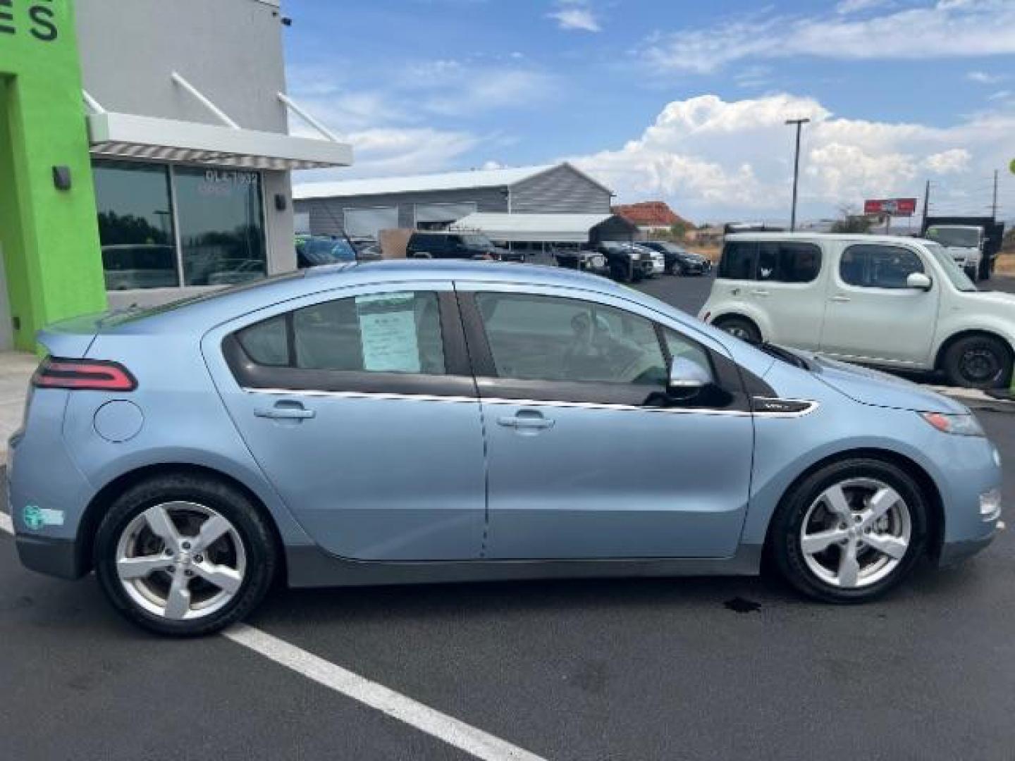 2014 Light Blue /Tan Cloth Interior Chevrolet Volt Premium w/ Navigation and LEP (1G1RH6E45EU) with an 1.4L L4 DOHC 16V PLUG-IN HYBRID engine, Continuously Variable Transmission transmission, located at 940 North Main Street, Cedar City, UT, 84720, (435) 628-0023, 37.692936, -113.061897 - ***This vehicle qualifies for the EV/Hybrid tax rebate of up to $4,000*** We are setup with the IRS to recieve direct payments within 72 hours. We file the rebate online with IRS and can credit it to your down payment, reduce the sales price OR give you cashback!! These cars will not last and can o - Photo#7