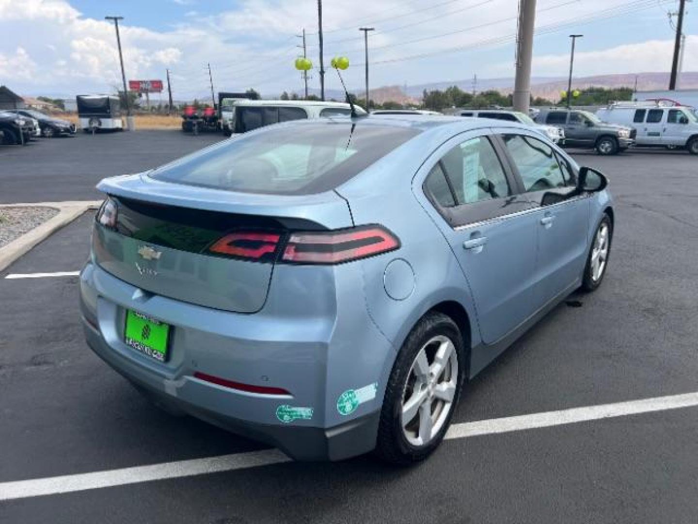 2014 Light Blue /Tan Cloth Interior Chevrolet Volt Premium w/ Navigation and LEP (1G1RH6E45EU) with an 1.4L L4 DOHC 16V PLUG-IN HYBRID engine, Continuously Variable Transmission transmission, located at 940 North Main Street, Cedar City, UT, 84720, (435) 628-0023, 37.692936, -113.061897 - ***This vehicle qualifies for the EV/Hybrid tax rebate of up to $4,000*** We are setup with the IRS to recieve direct payments within 72 hours. We file the rebate online with IRS and can credit it to your down payment, reduce the sales price OR give you cashback!! These cars will not last and can o - Photo#6