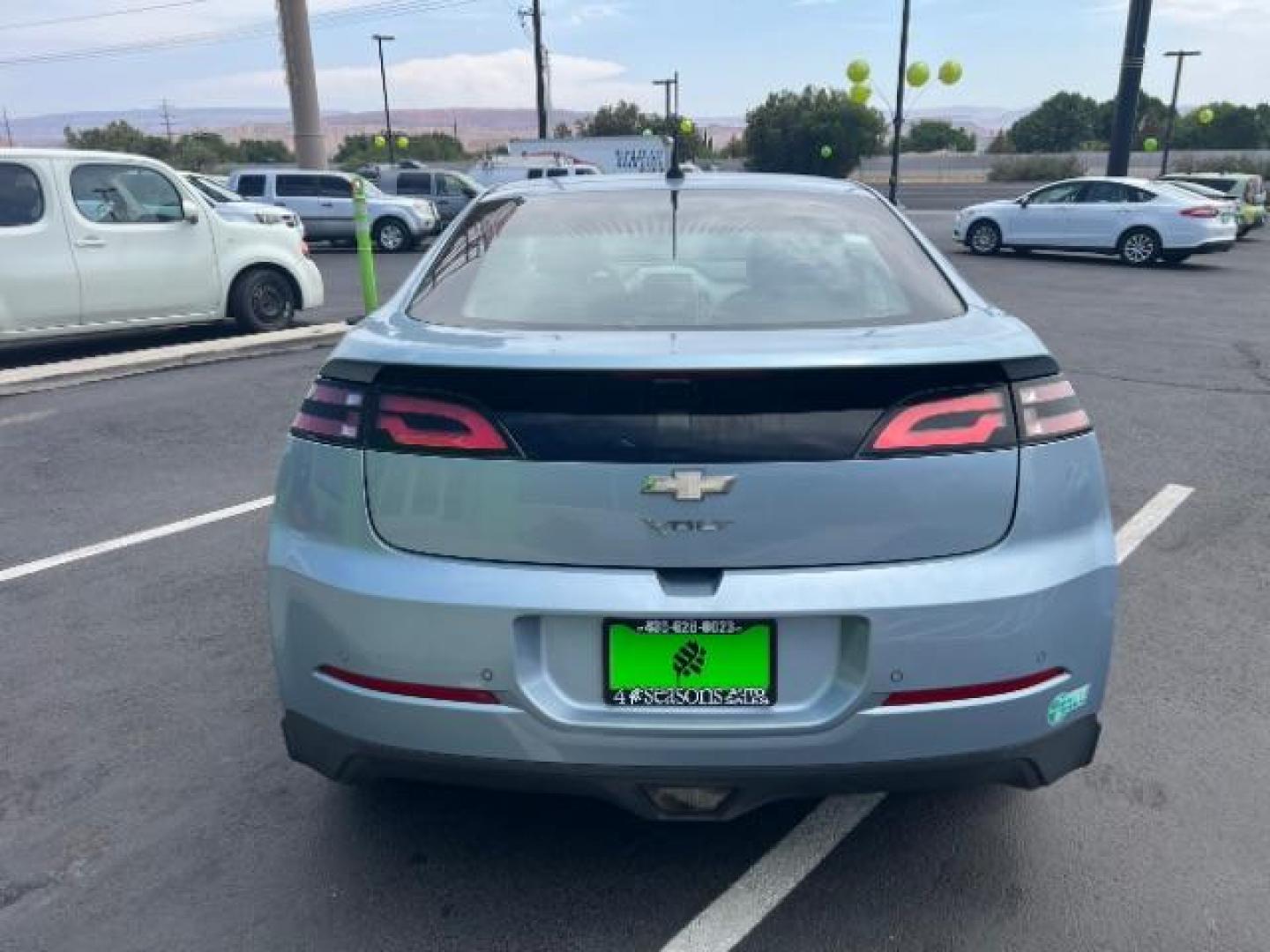 2014 Blue /Tan Cloth Interior Chevrolet Volt Premium w/ Navigation and LEP (1G1RH6E45EU) with an 1.4L L4 DOHC 16V PLUG-IN HYBRID engine, Continuously Variable Transmission transmission, located at 940 North Main Street, Cedar City, UT, 84720, (435) 628-0023, 37.692936, -113.061897 - ***This vehicle qualifies for the EV/Hybrid tax rebate of up to $4,000*** We are setup with the IRS to recieve direct payments within 72 hours. We file the rebate online with IRS and can credit it to your down payment, reduce the sales price OR give you cashback!! These cars will not last and can o - Photo#5