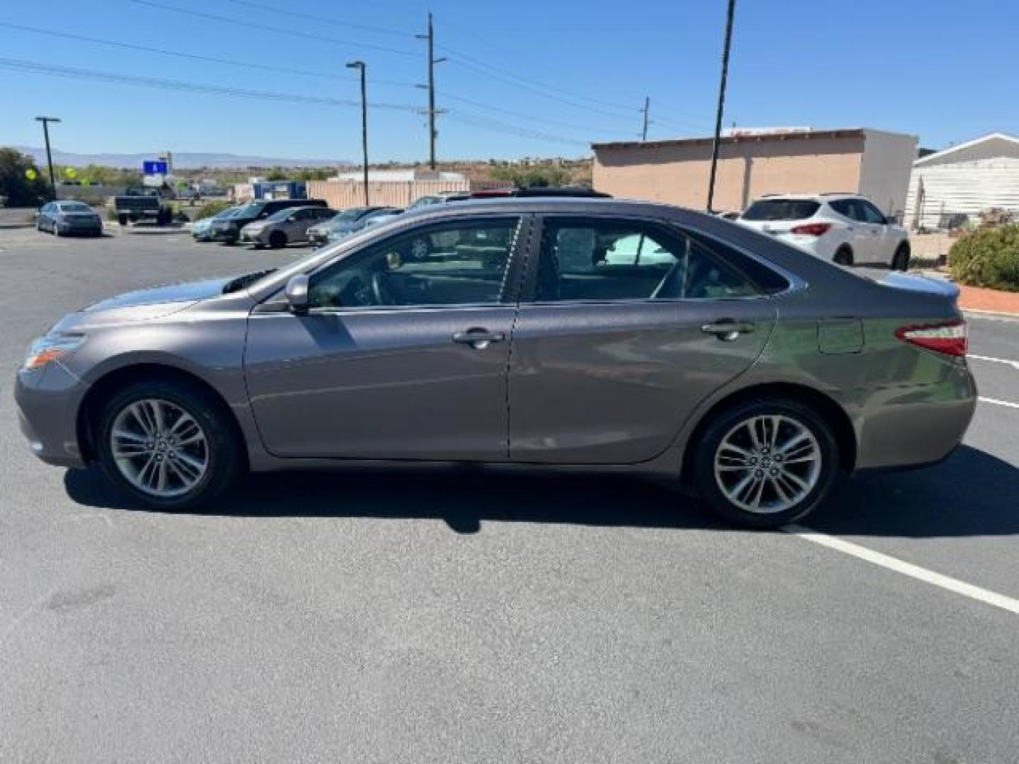 2015 Predawn Gray Mica /Black, leatherette/cloth Toyota Camry SE (4T1BF1FK3FU) with an 2.5L L4 DOHC 16V engine, 6-Speed Automatic transmission, located at 940 North Main Street, Cedar City, UT, 84720, (435) 628-0023, 37.692936, -113.061897 - We specialize in helping ALL people get the best financing available. No matter your credit score, good, bad or none we can get you an amazing rate. Had a bankruptcy, divorce, or repossessions? We give you the green light to get your credit back on the road. Low down and affordable payments that fit - Photo#3